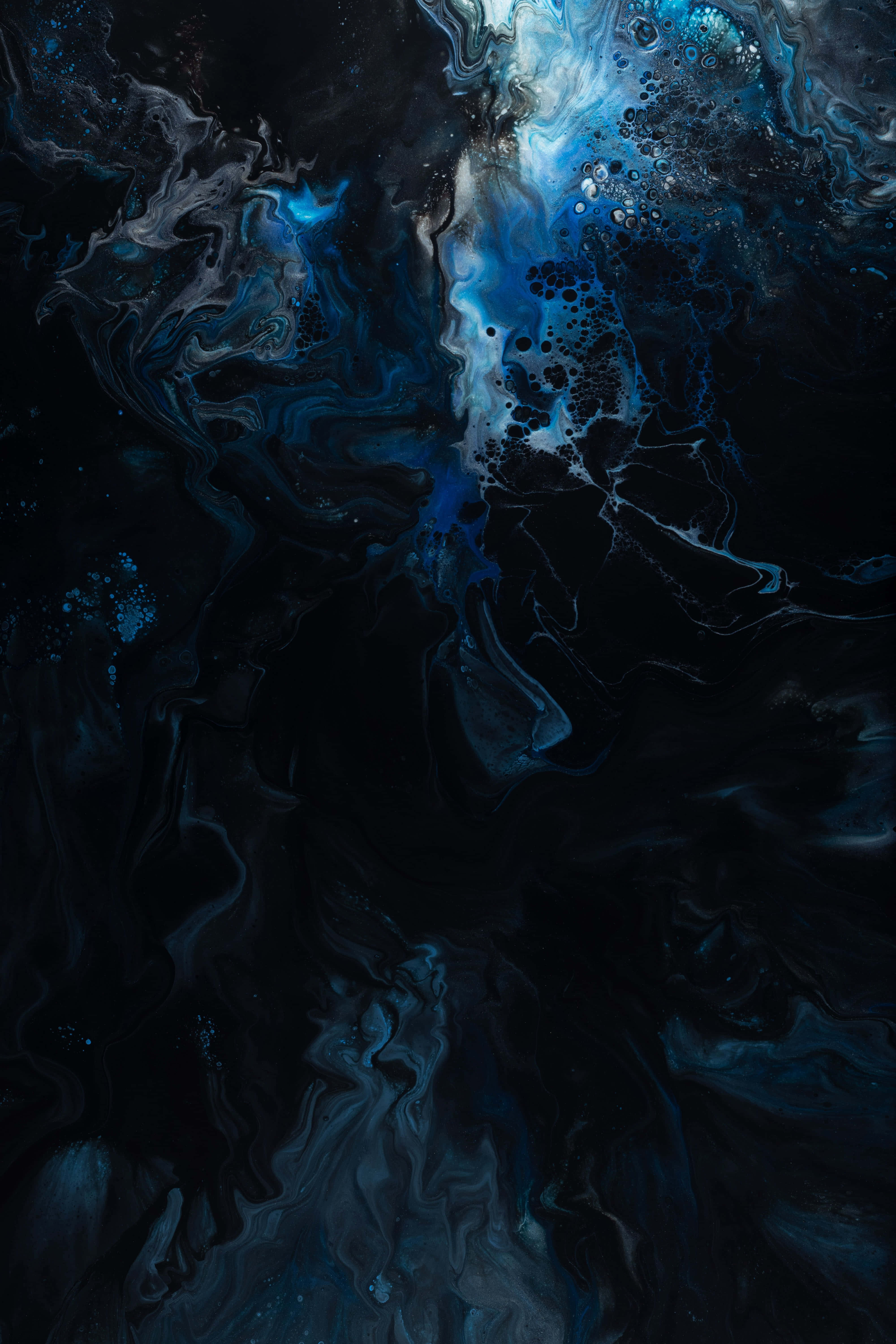 a black and blue painting Picha ya Ukuta