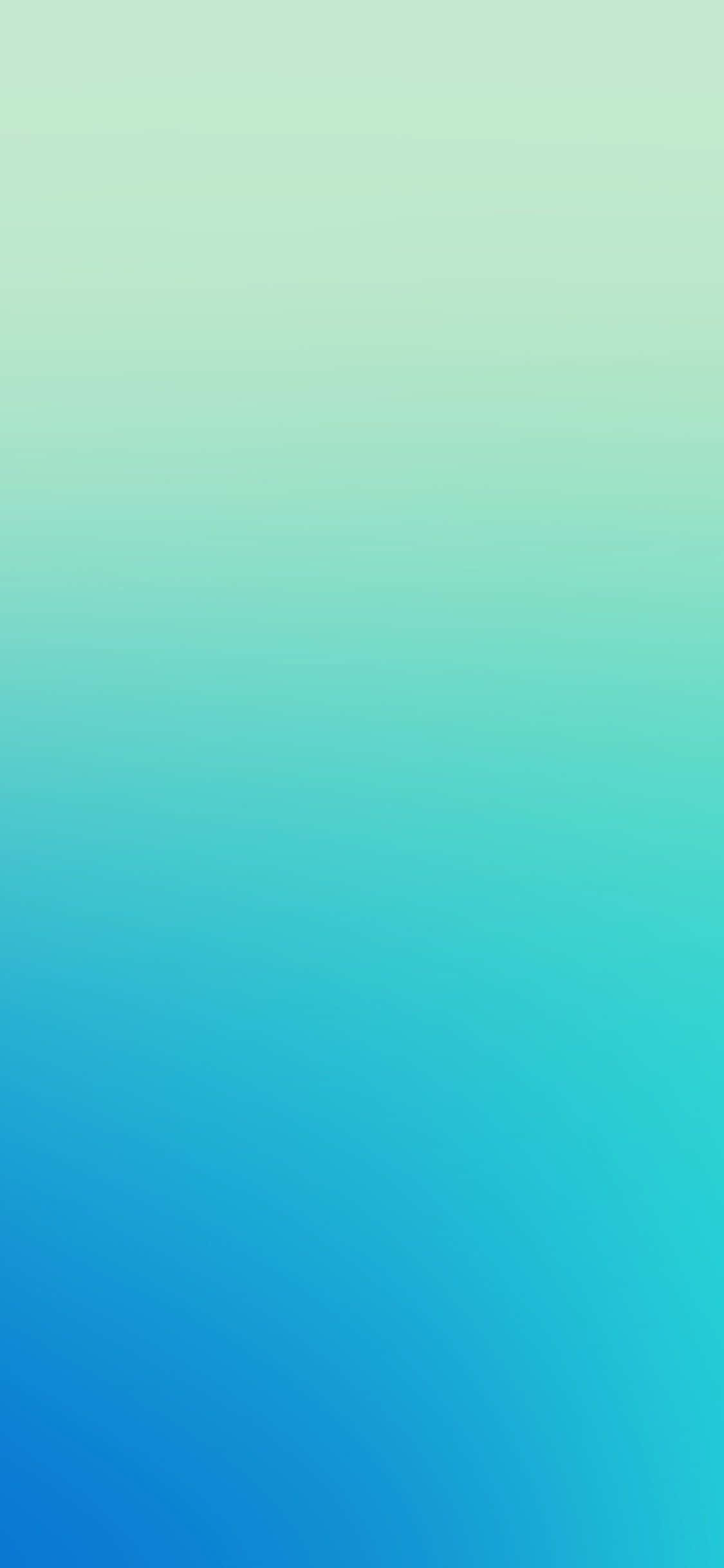 a blue and green gradient background Picha ya Ukuta