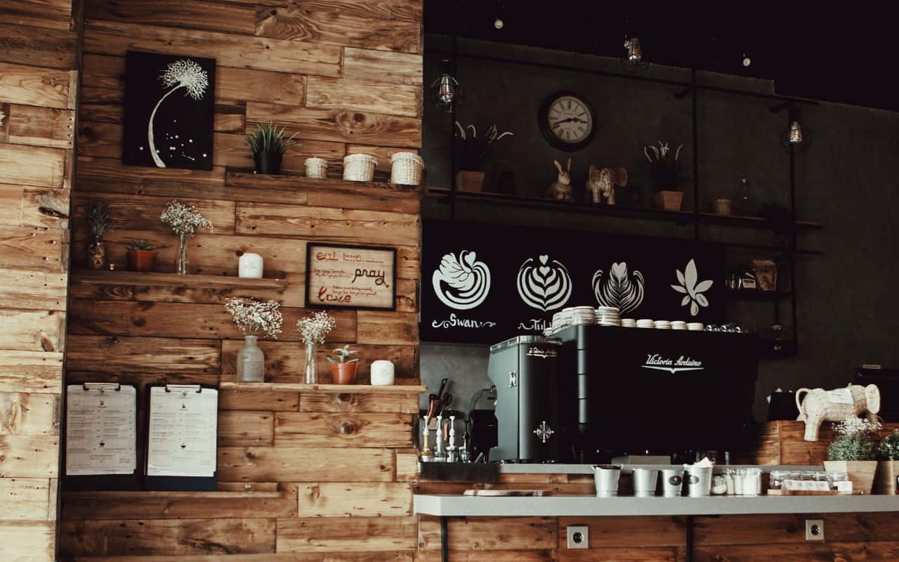 a coffee shop with wooden walls and a wooden counter Picha ya Ukuta