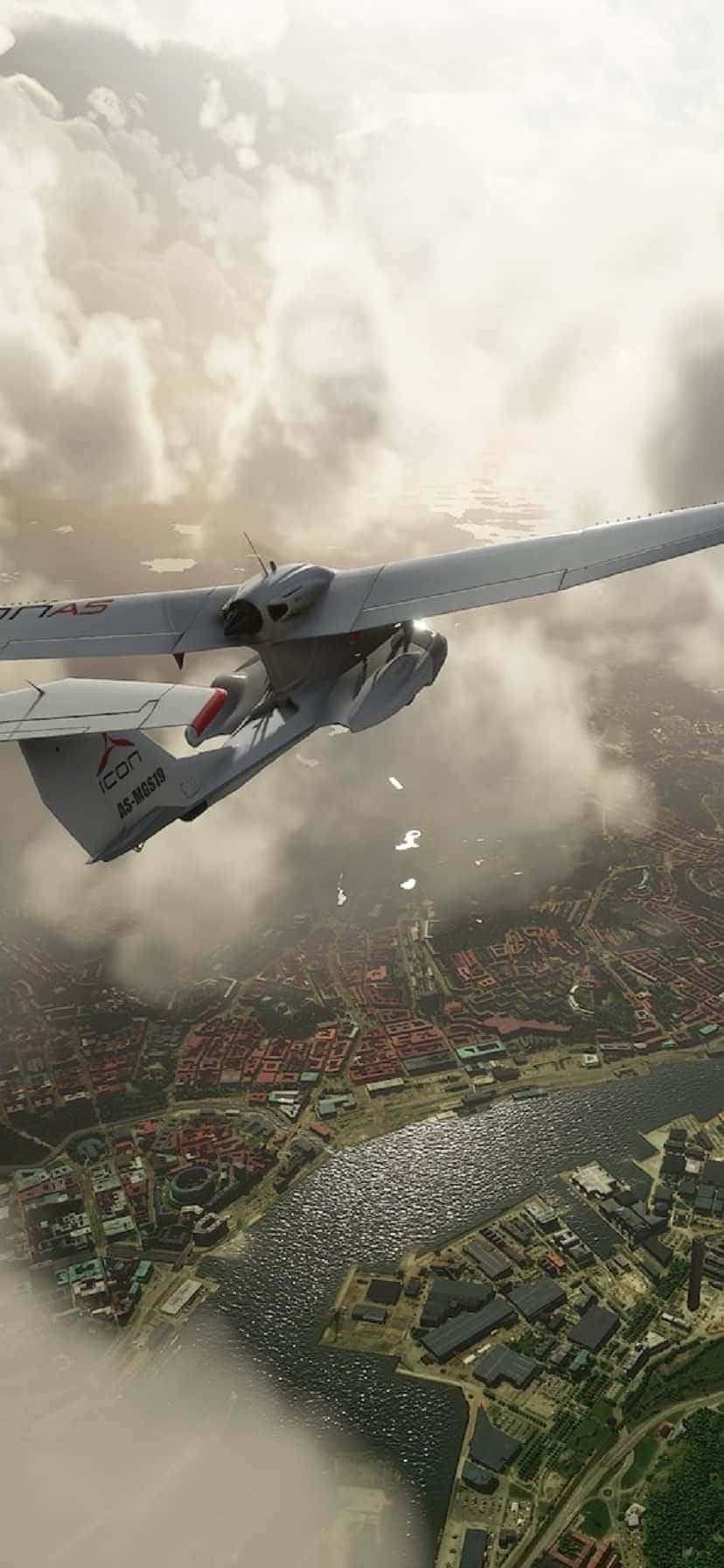 a small plane flying over a city Picha ya Ukuta