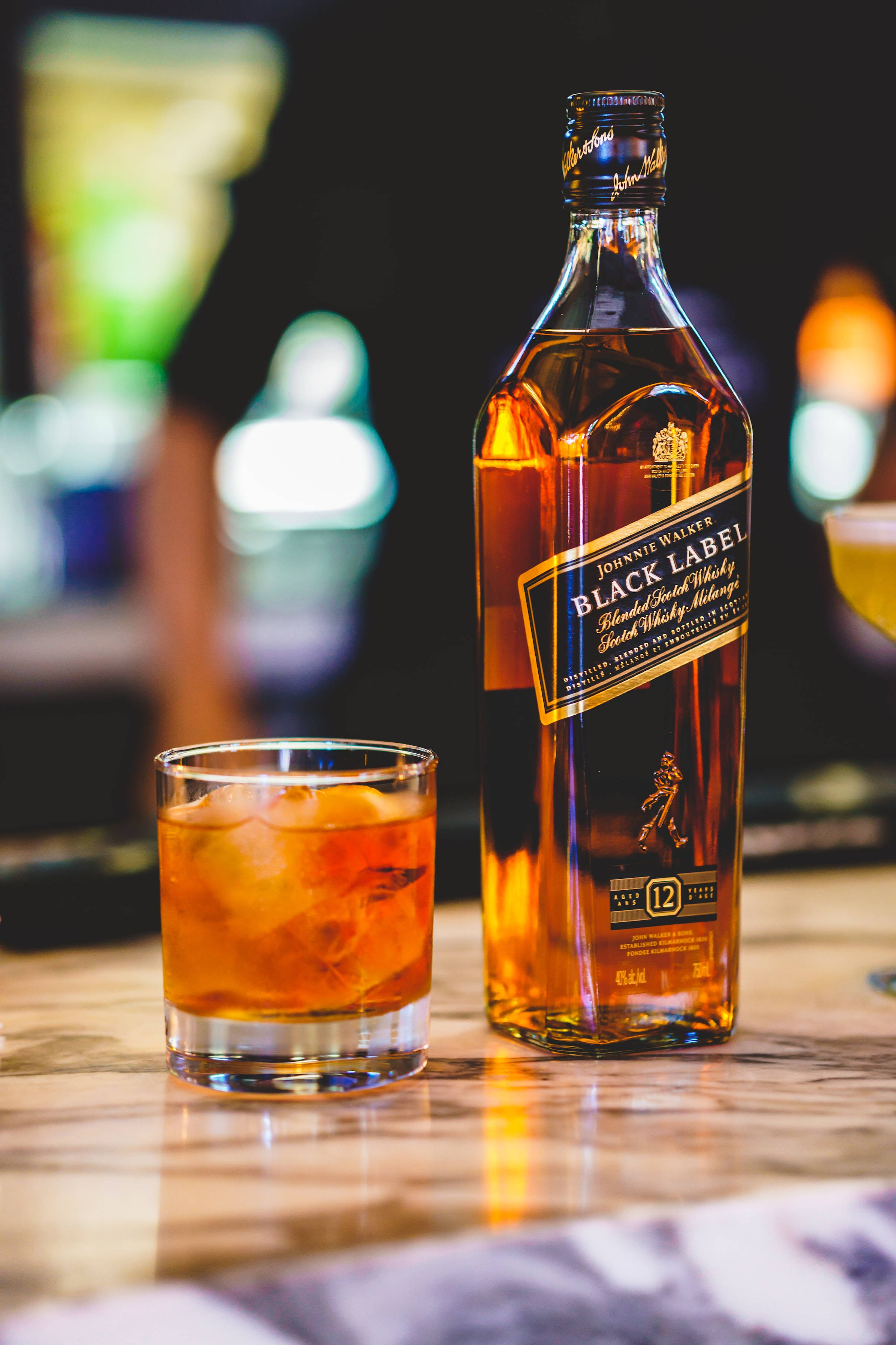 A Sophisticated Taste - Black Label Whiskey Bottle and Glass Picha ya Ukuta
