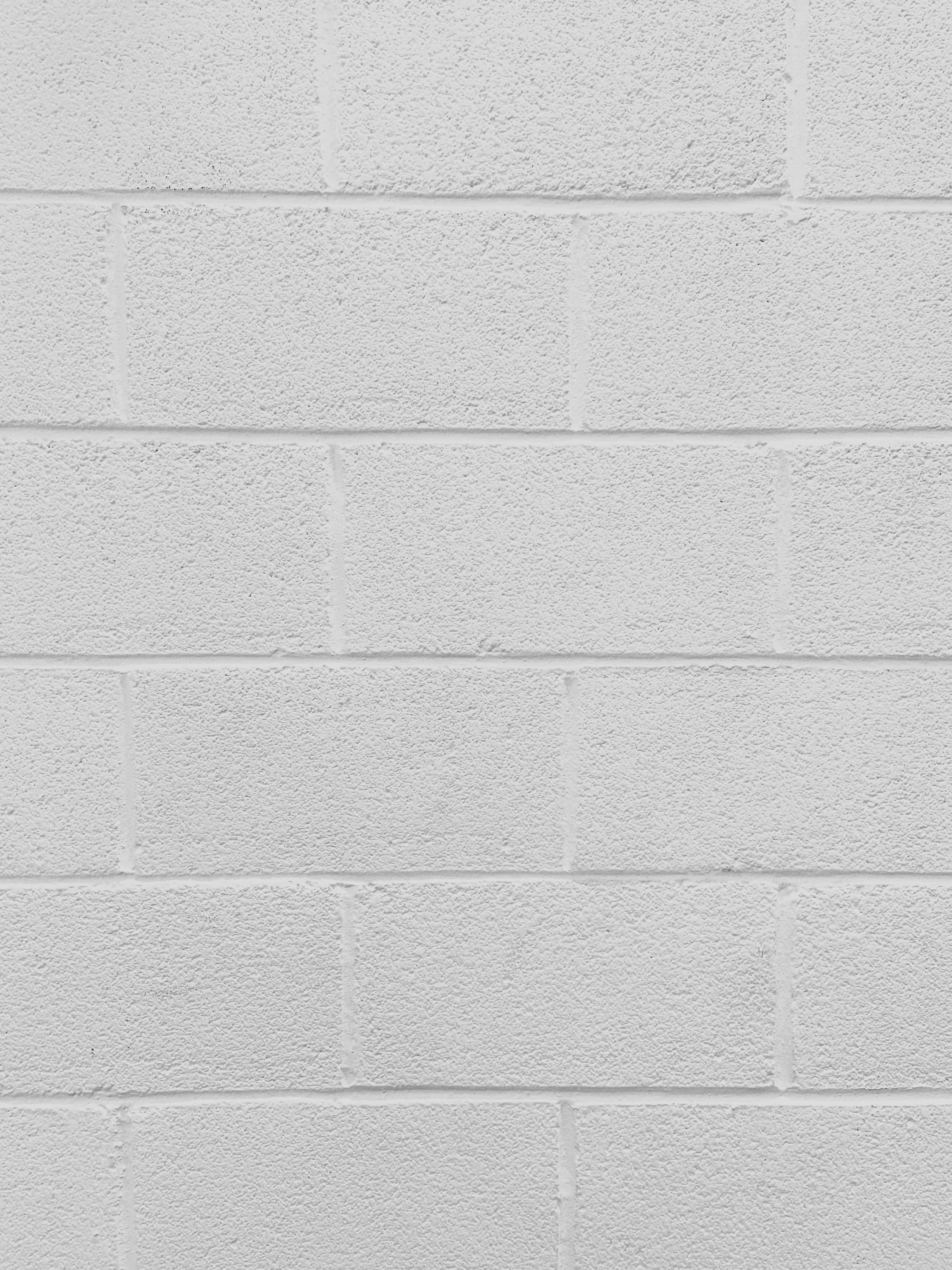 a white brick wall with a white brick texture Picha ya Ukuta