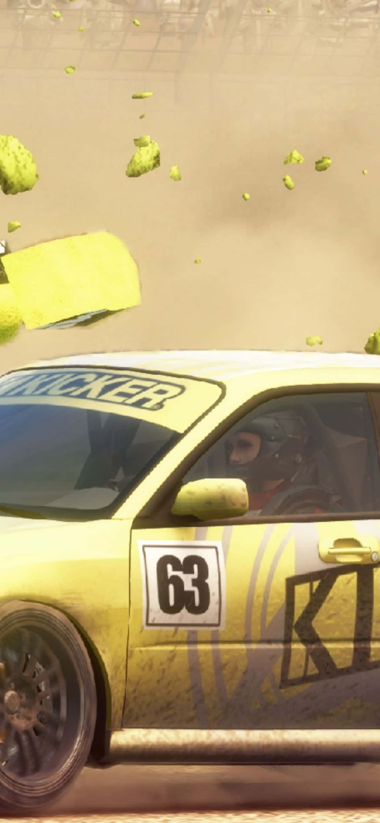a yellow car is driving through the dirt Picha ya Ukuta