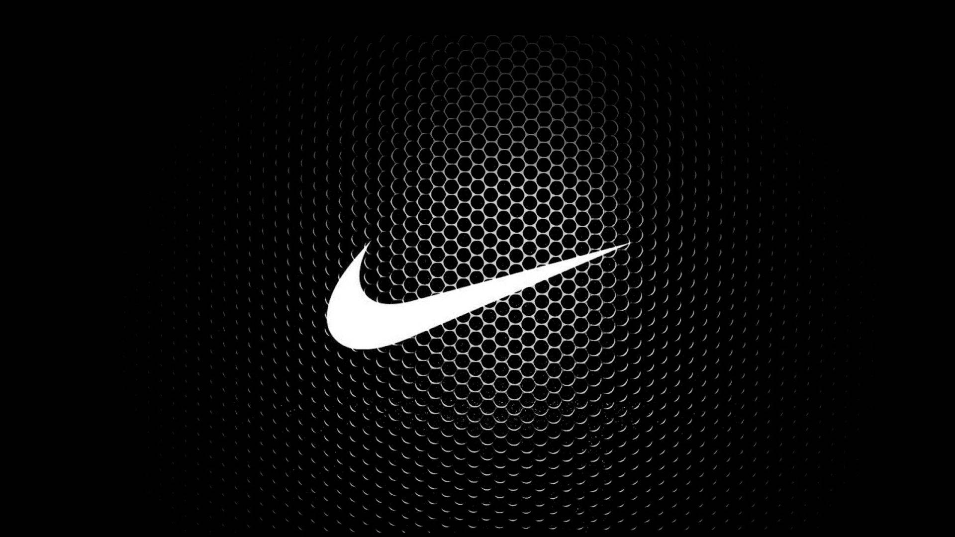 Alama ya Nike yenye Muundo wa Hexagoni Mzuri Picha ya Ukuta