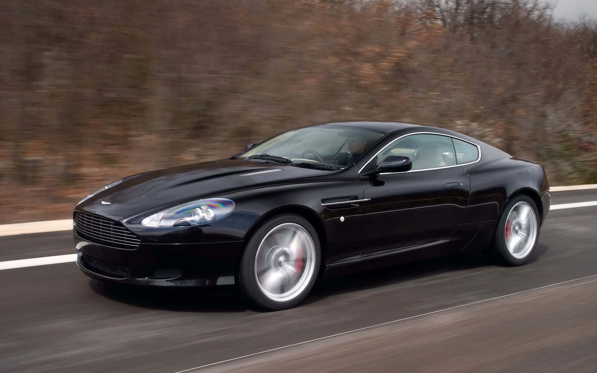 Aston Martin DB9 yenye Mwonekano wa kushtakiwa kwenye Mwonekano wa kushtakiwa wa Mwonekano wa kushtakiwa Picha ya Ukuta