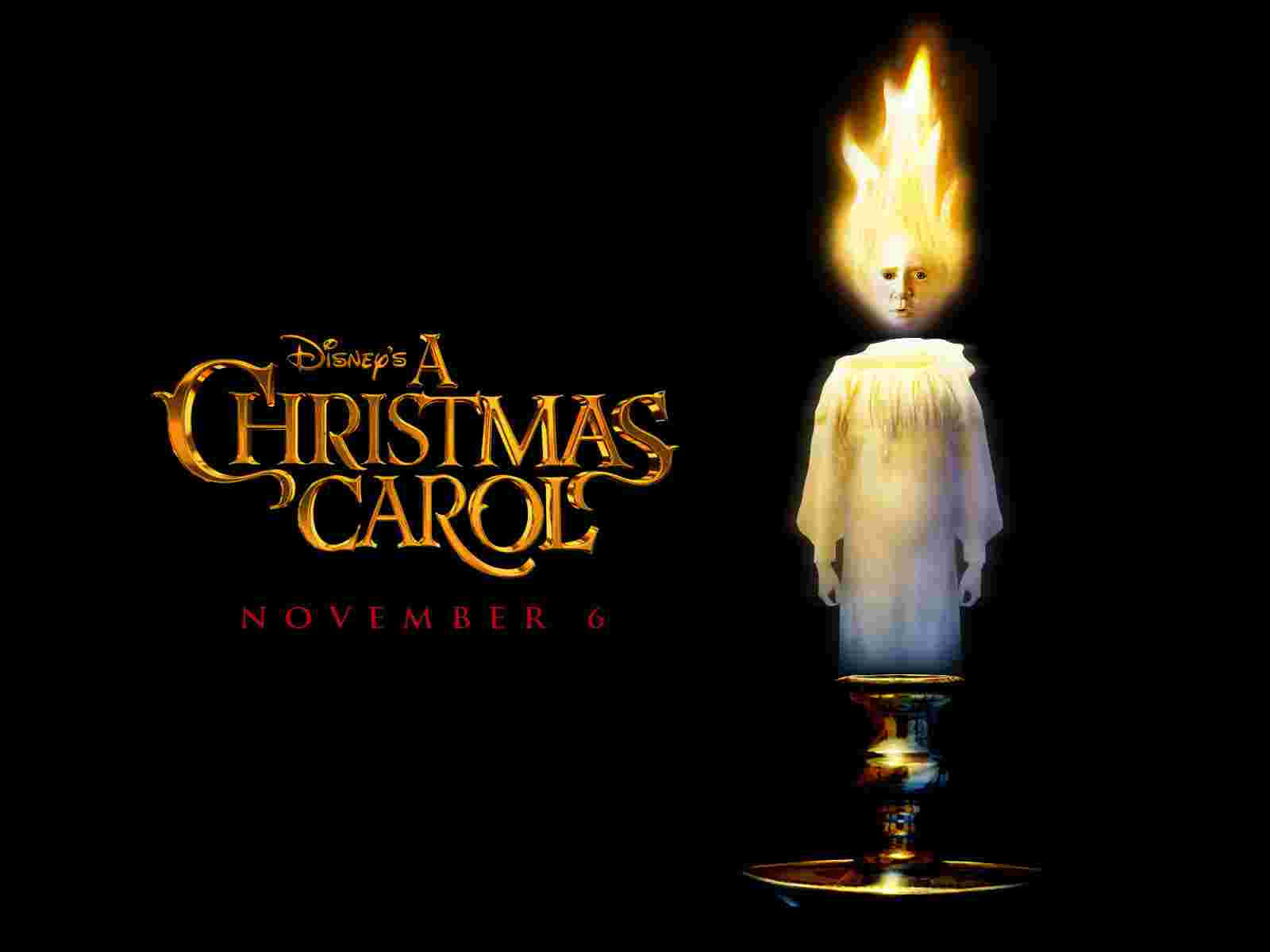 Bango la a Christmas Carol lenye mshumaa juu yake Picha ya Ukuta