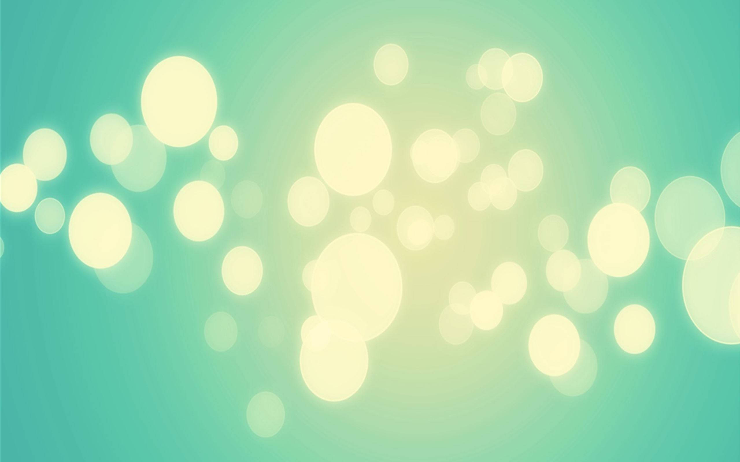 Bokeh Inayong'aa ya iPad ya Kisanii Picha ya Ukuta