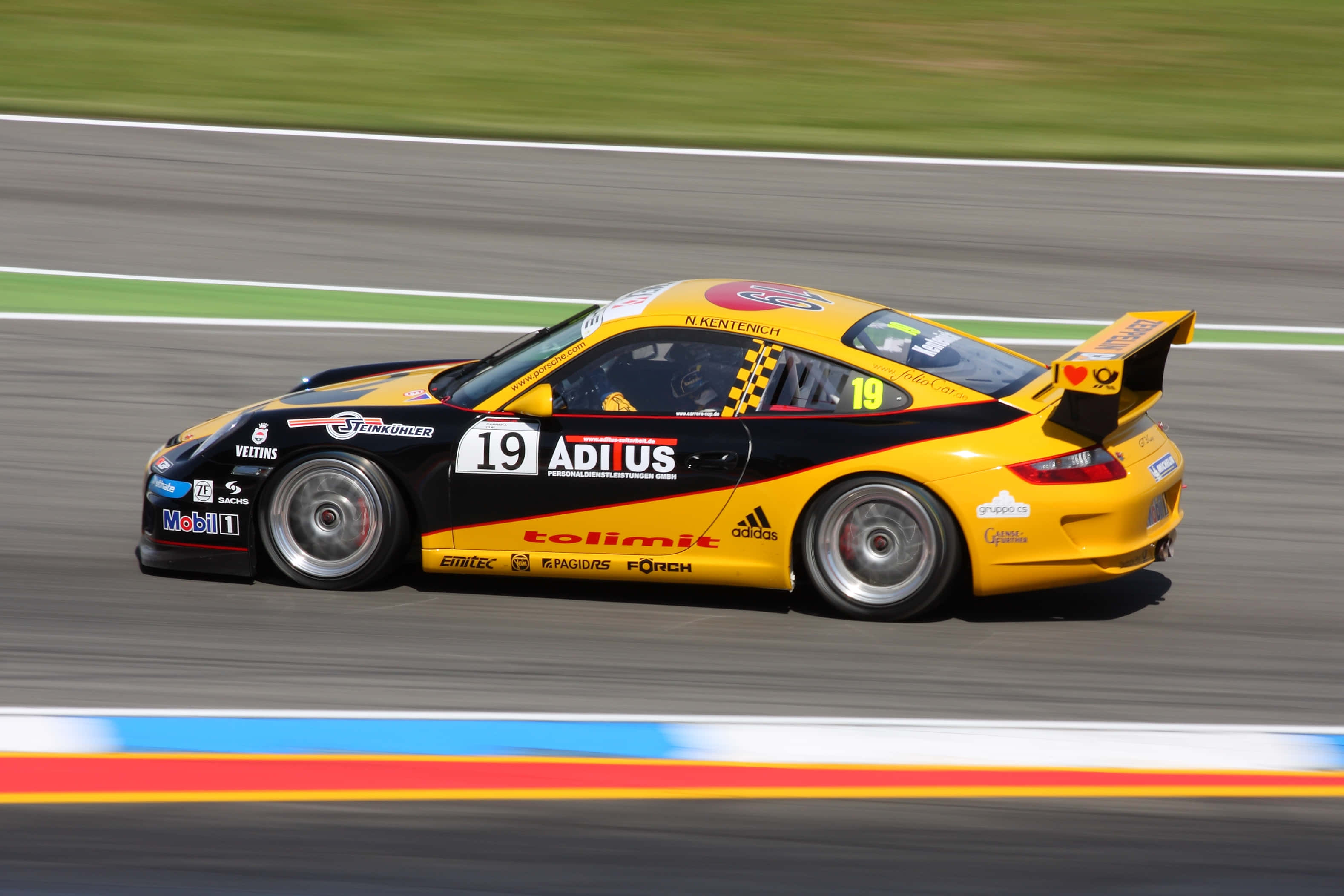 Captivating Speed: The Ultimate High-Stakes Car Race Picha ya Ukuta