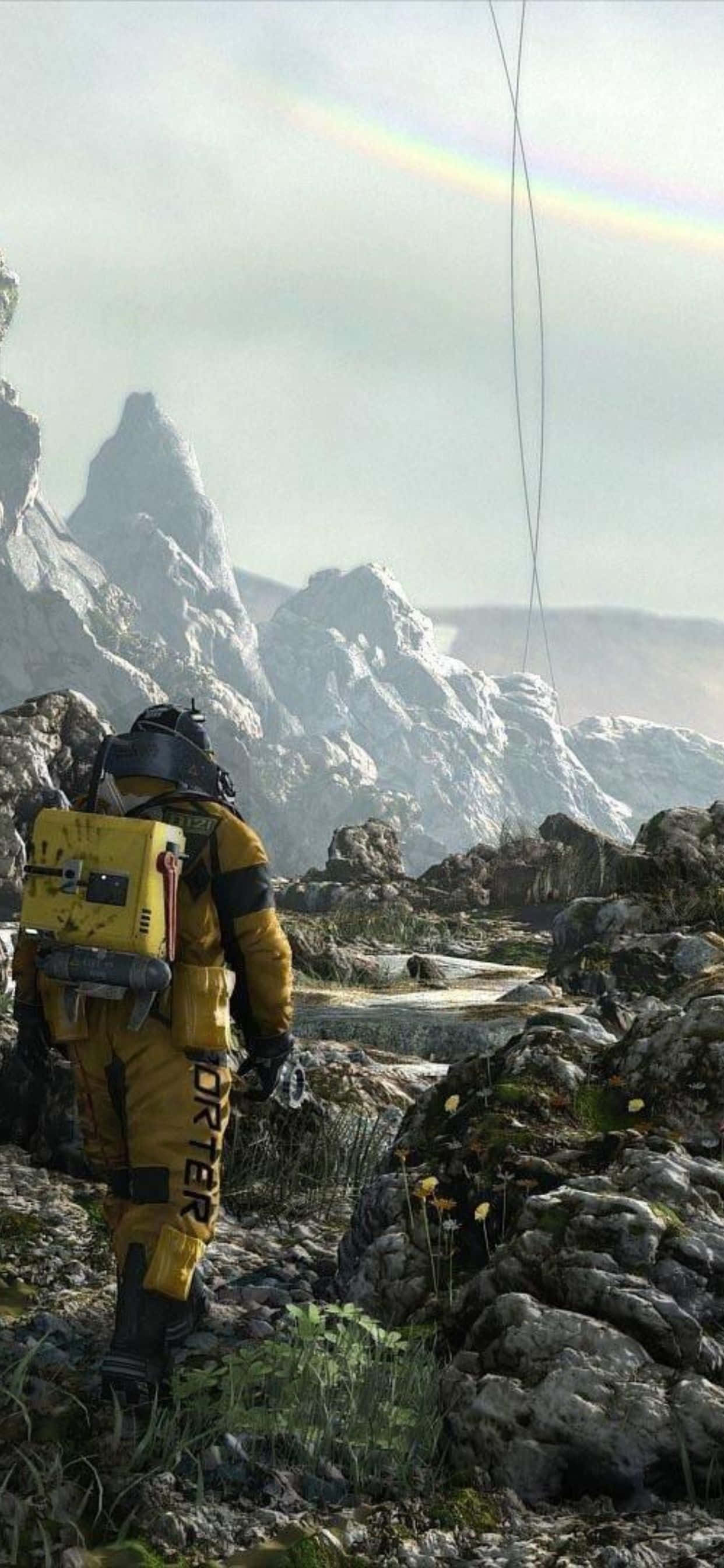 Death Stranding na iPhone Xs Max wamejumuika kwa Safari ya Kusaidia. Picha ya Ukuta