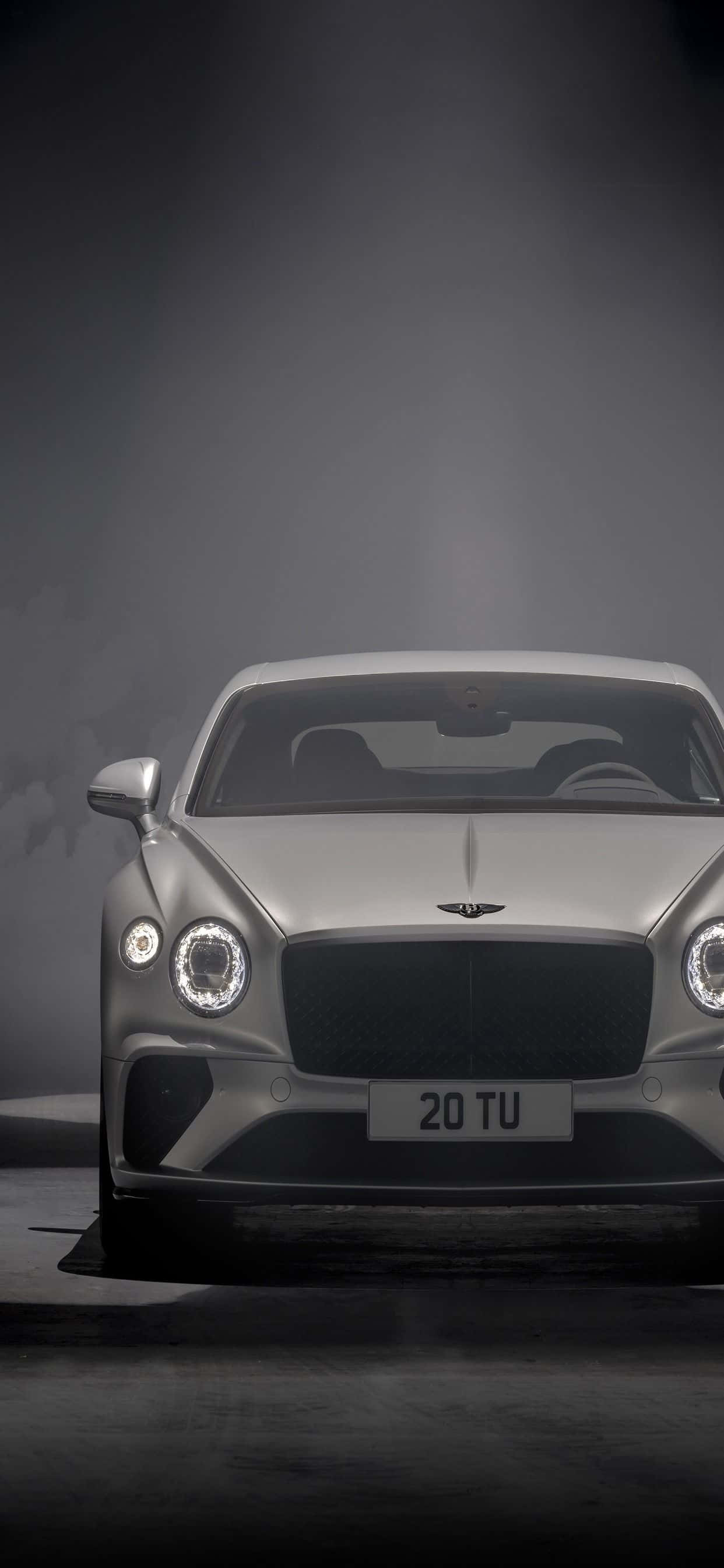 Delving Into Luxury: An iPhone Xs Max in a Bentley Picha ya Ukuta