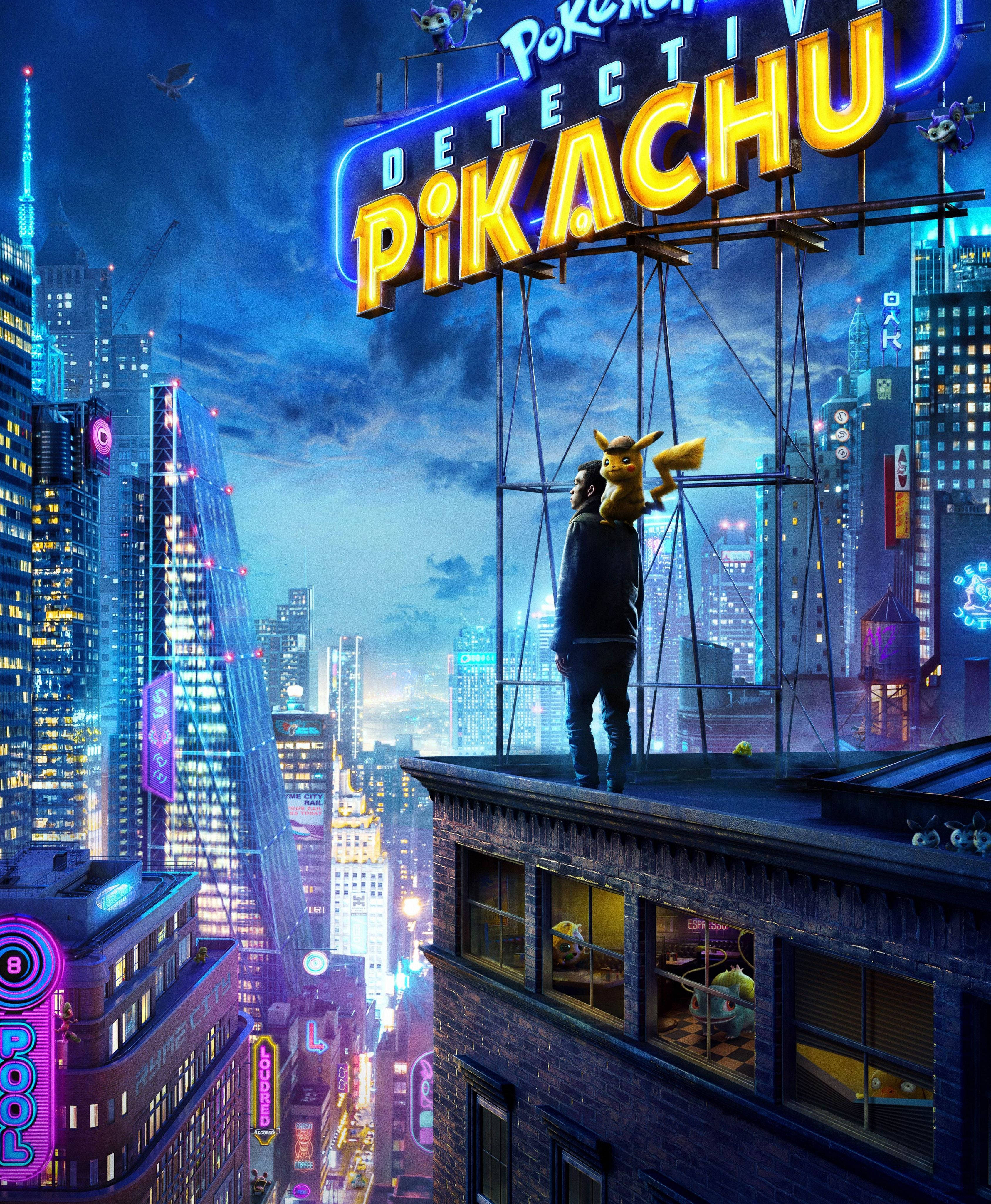 Detective Pikachu Na Mtu Juu ya Rooftop Picha ya Ukuta