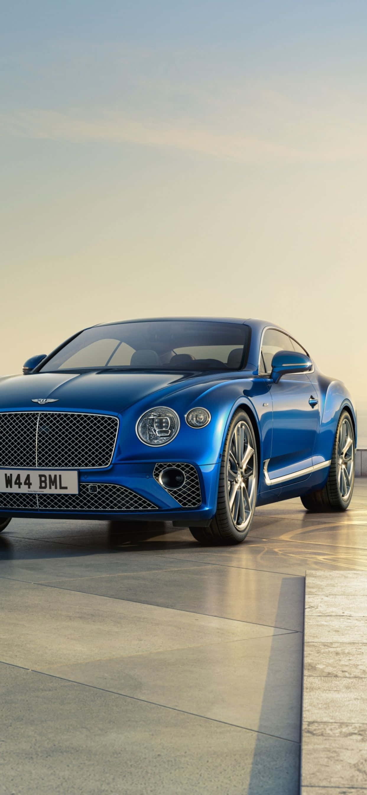 Enjoy the luxury of the iPhone Xs Max and a Bentley Picha ya Ukuta
