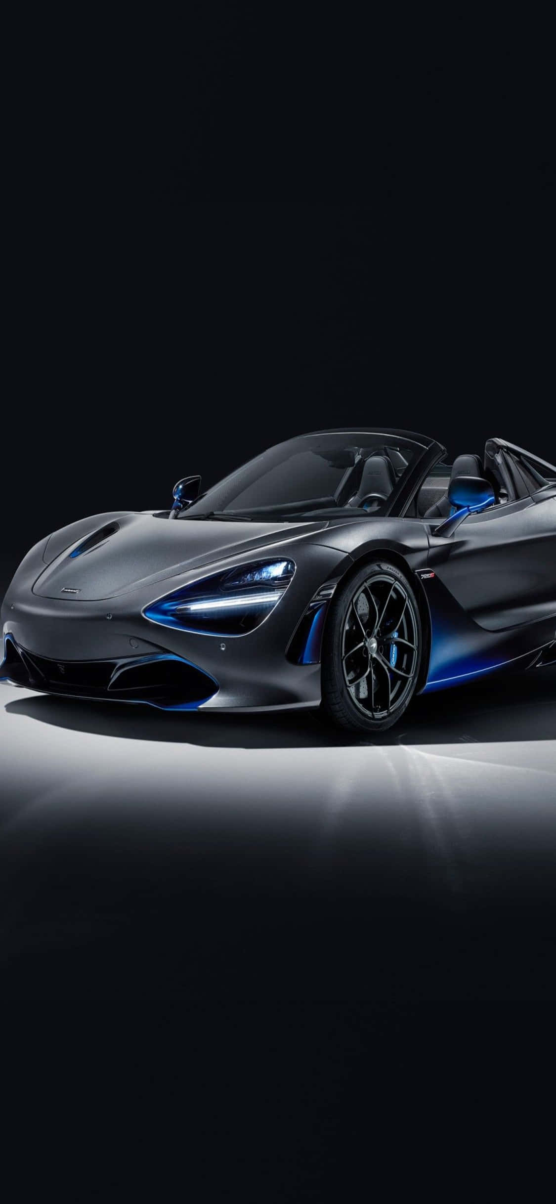 Kumbuka Nguvu Isiyo na Kifani ya iPhone Xs na McLaren 720S Picha ya Ukuta