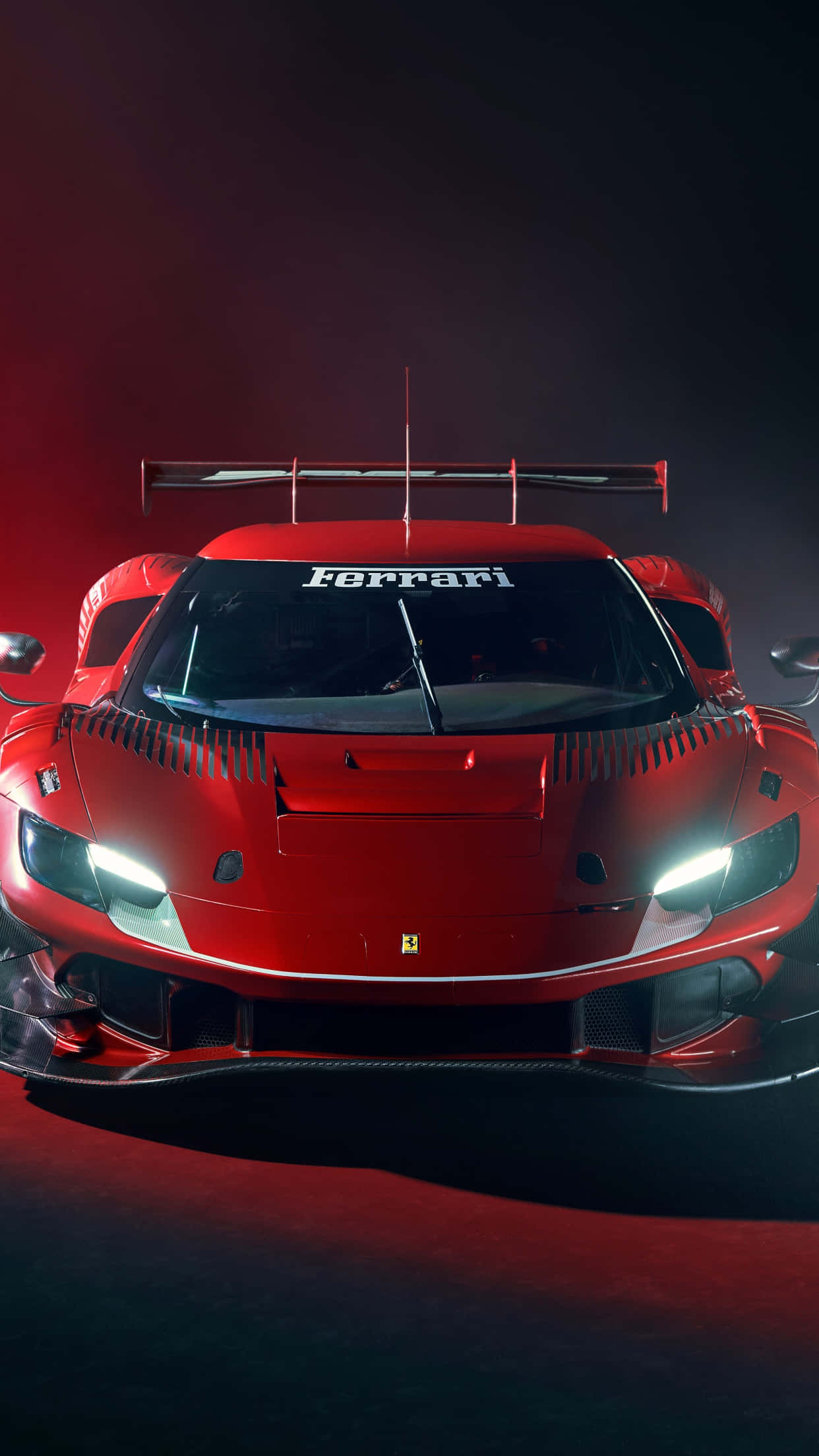Gari la michezo la Ferrari Nyekundu la iPhone X Picha ya Ukuta