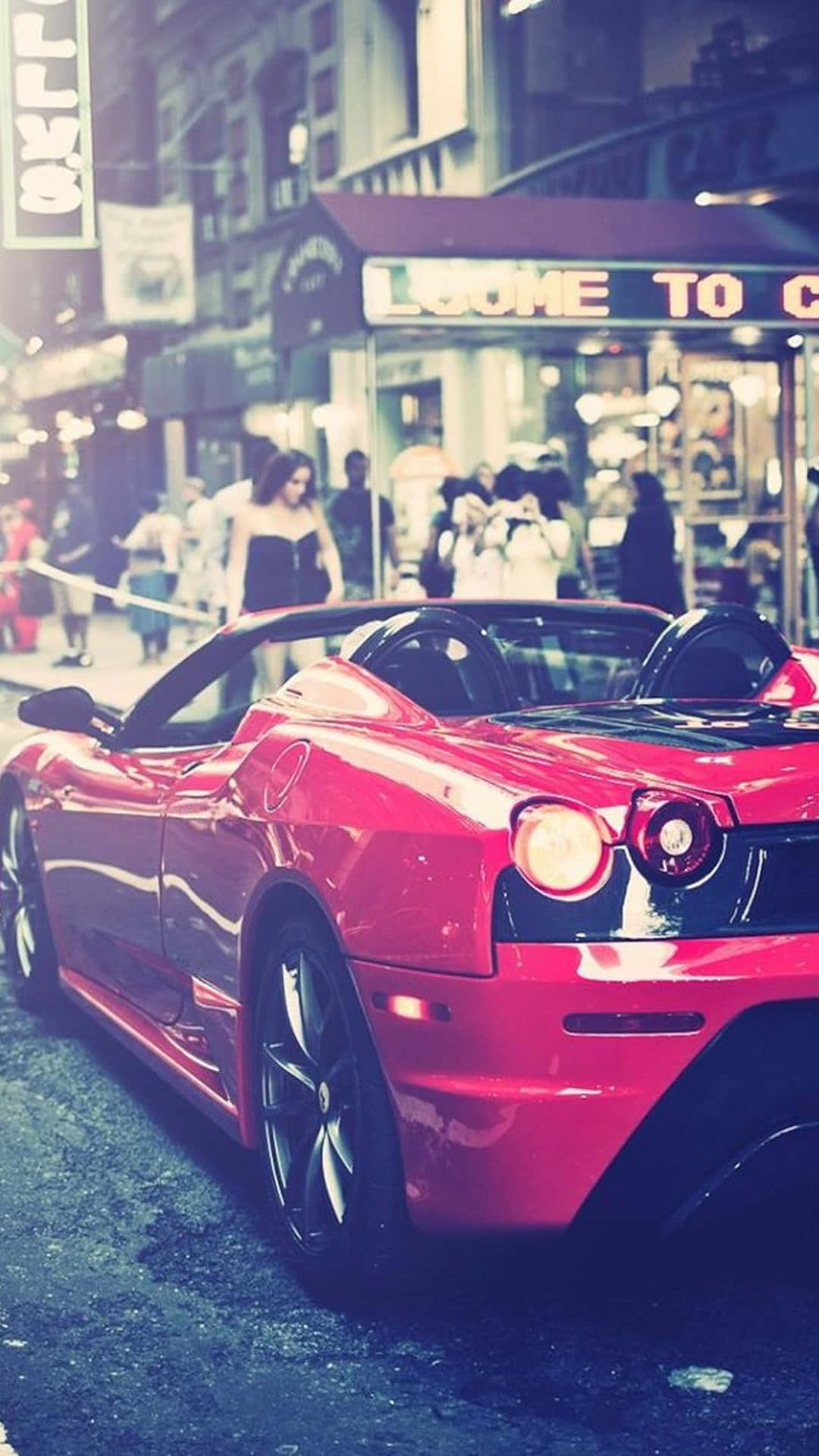 Gari Nyekundu la Ferrari la Mbio za Mitaani Picha ya Ukuta