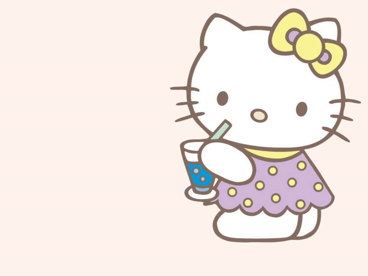 Hello Kitty Anakondoa Kinywaji Kwenye Laptop Picha ya Ukuta