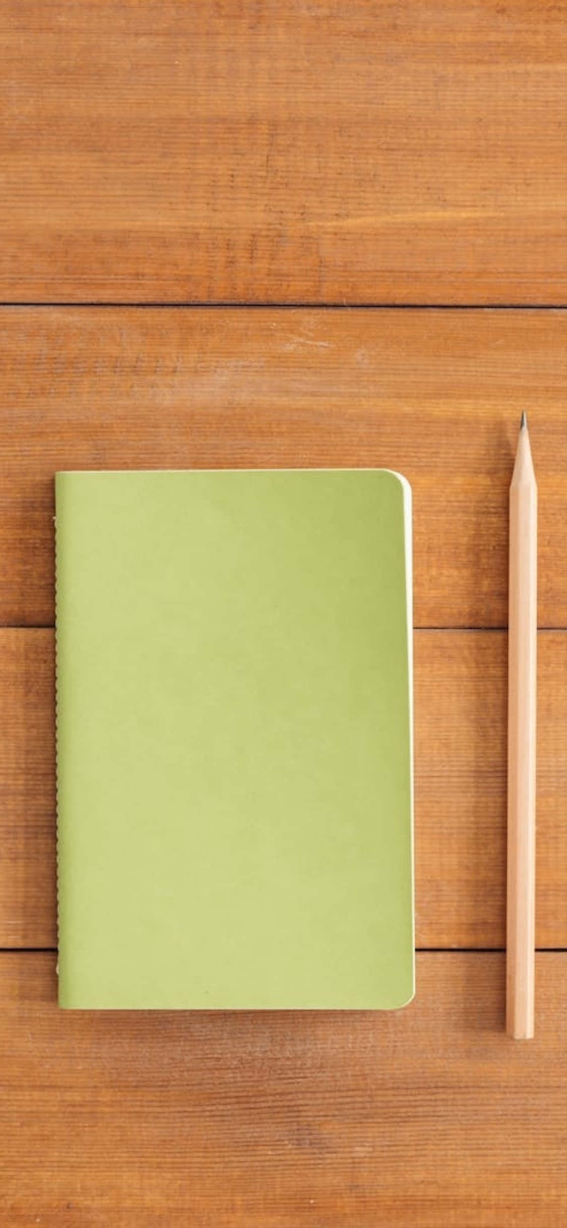 iPhone X Desk Background Notebook With A Pencil Picha ya Ukuta