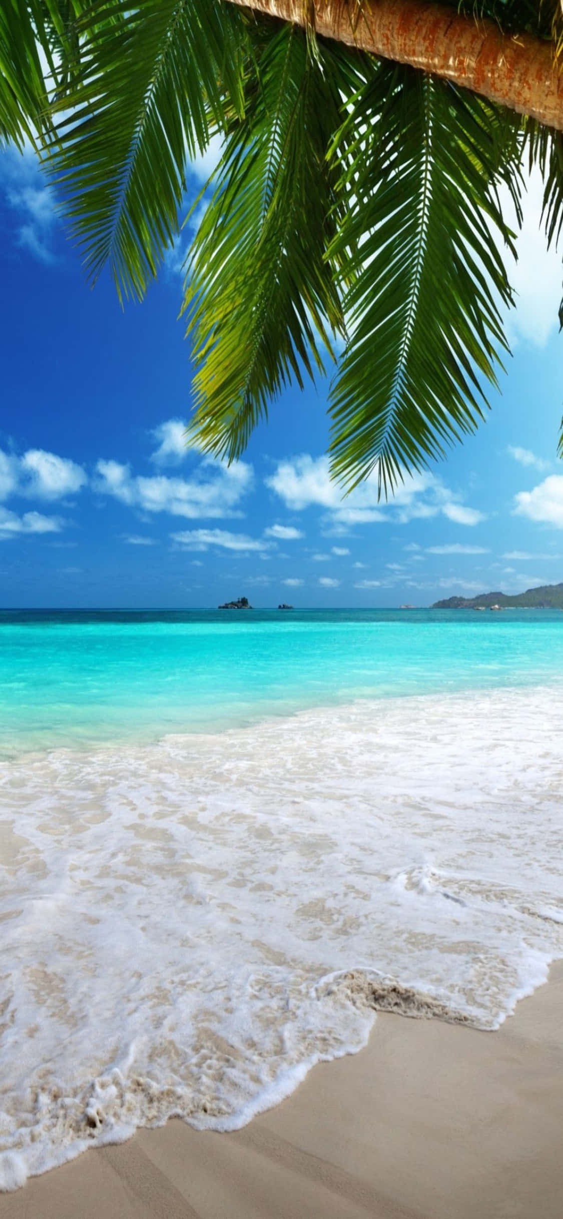 iPhone XS Beach Shimmering Waters Background Picha ya Ukuta