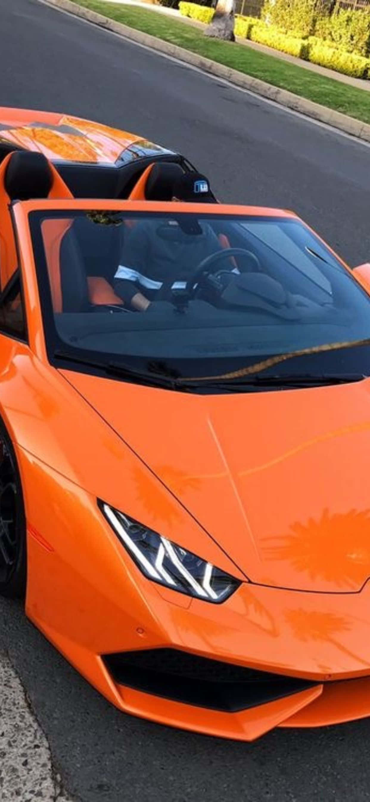 iPhone XS Max Lamborghini Huracan Orange Car Background Picha ya Ukuta