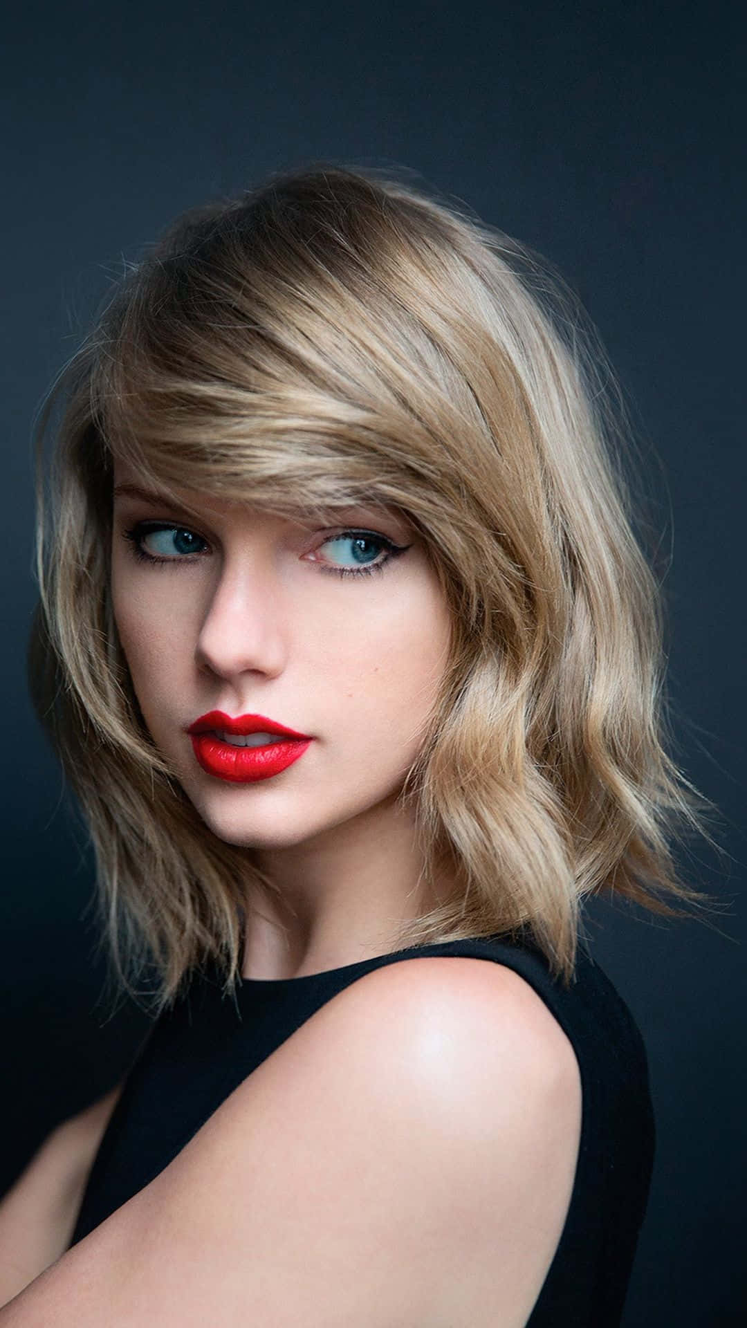 iPhone ya Taylor Swift Mwenye Nywele Fupi Picha ya Ukuta