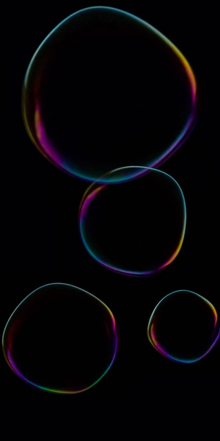 Kichwa: Bubbles za Rangi kwenye Skrini ya Xiaomi Redmi Note 9 Picha ya Ukuta
