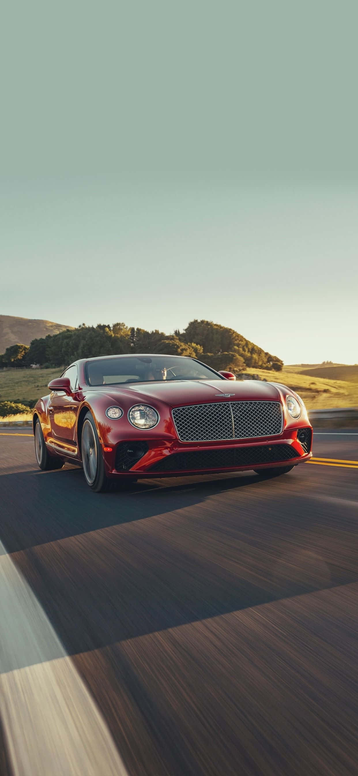 Kumbatia anasa na iPhone Xs Max mpya wa kifahari na Bentley. Picha ya Ukuta