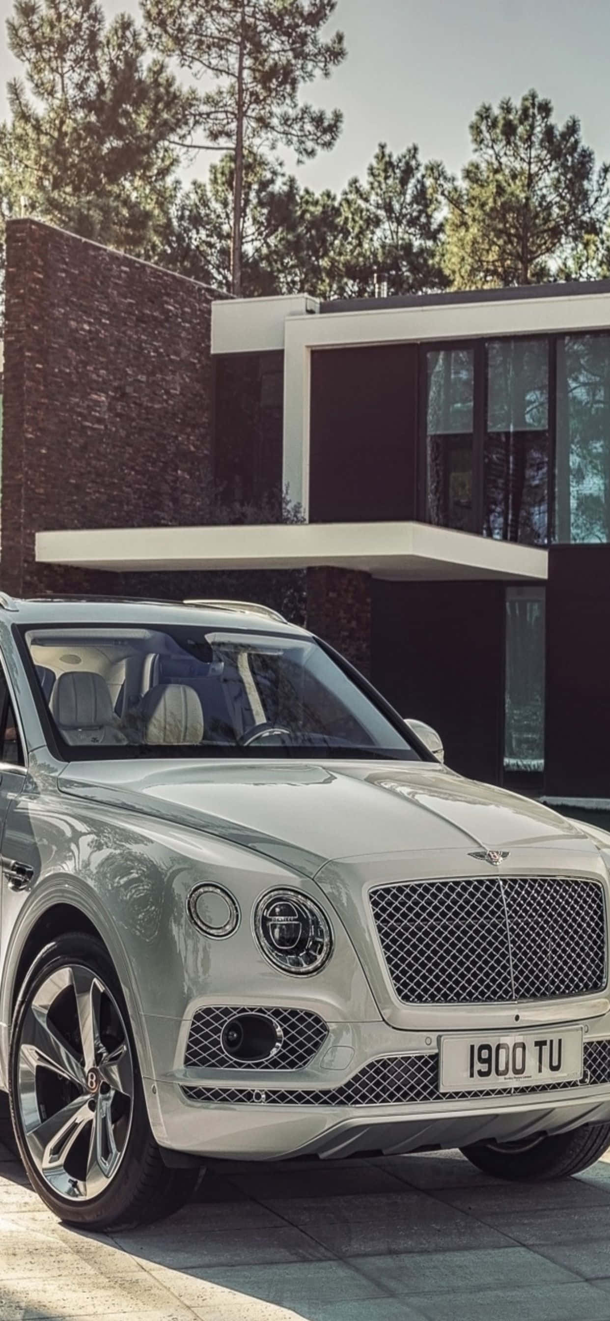 Kafurahi Maisha ya Luksu na iPhone Xs Max na Bentley Picha ya Ukuta