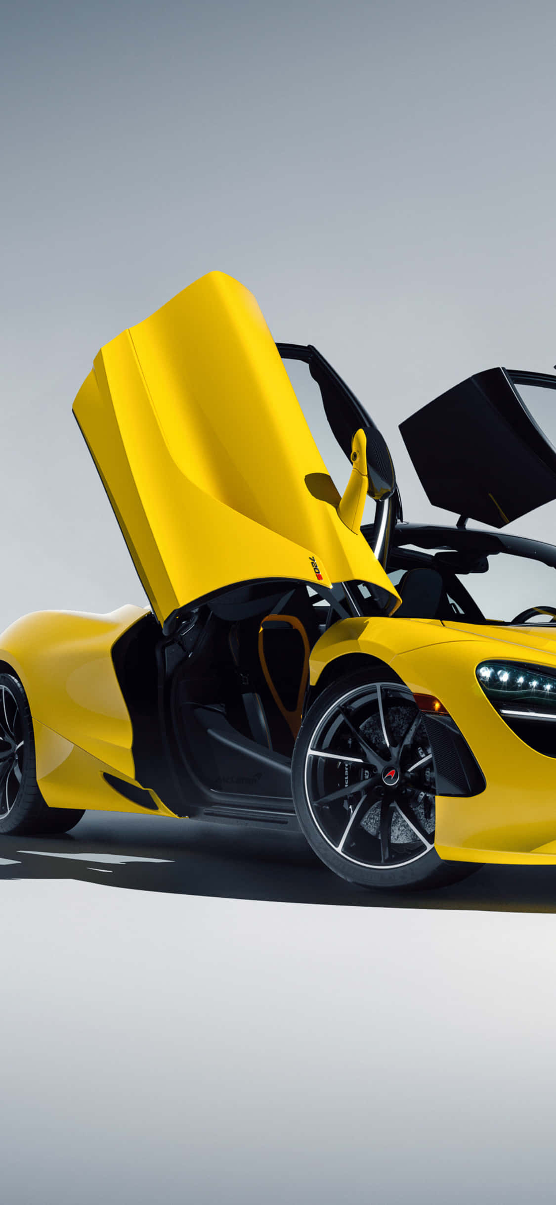 Kukumbatia mchanganyiko kamili wa anasa na utendaji wa kiwango cha juu – iPhone XS McLaren 720S Picha ya Ukuta
