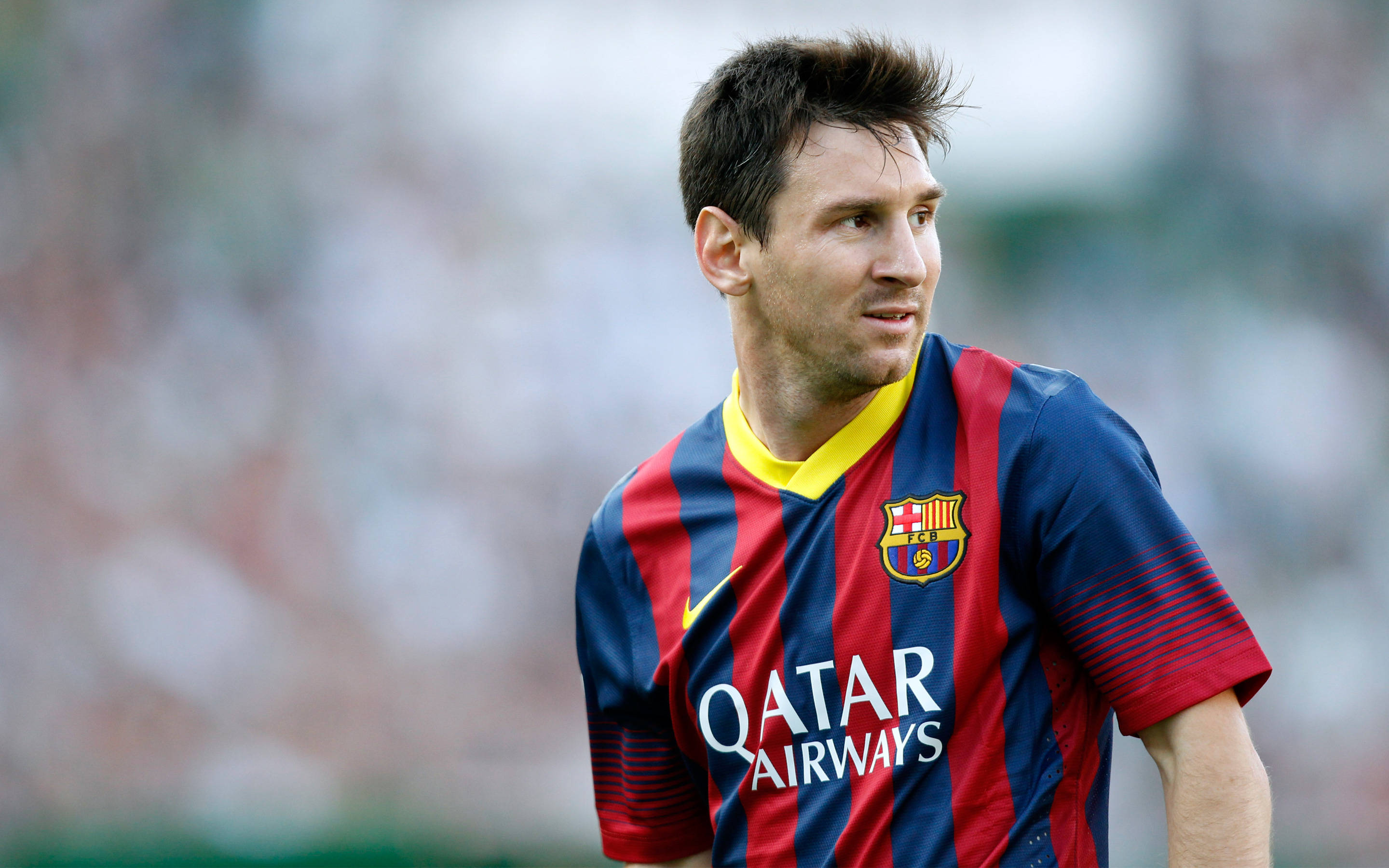Lionel Messi wakati wa mechi ya Barcelona, timu anayoiita nyumbani Picha ya Ukuta