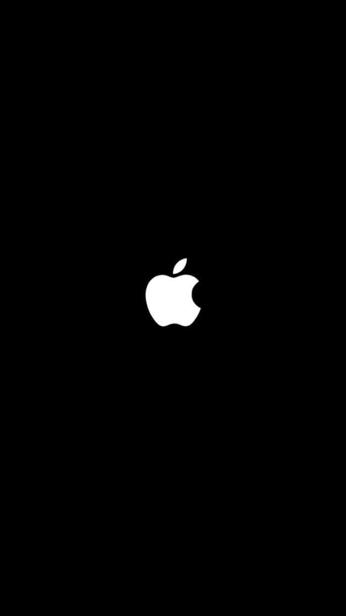 logo la apple linaloonyeshwa kwenye background nyeusi Picha ya Ukuta