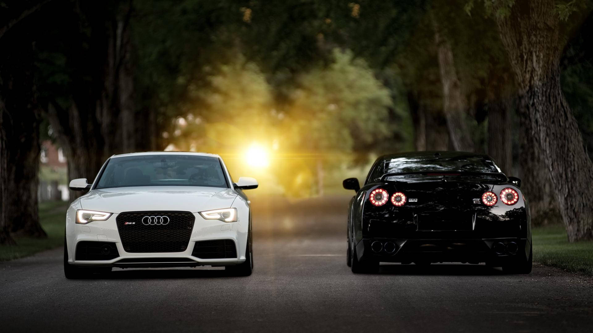 Magari Nyeupe na Nyeusi Nissan GTR Picha ya Ukuta