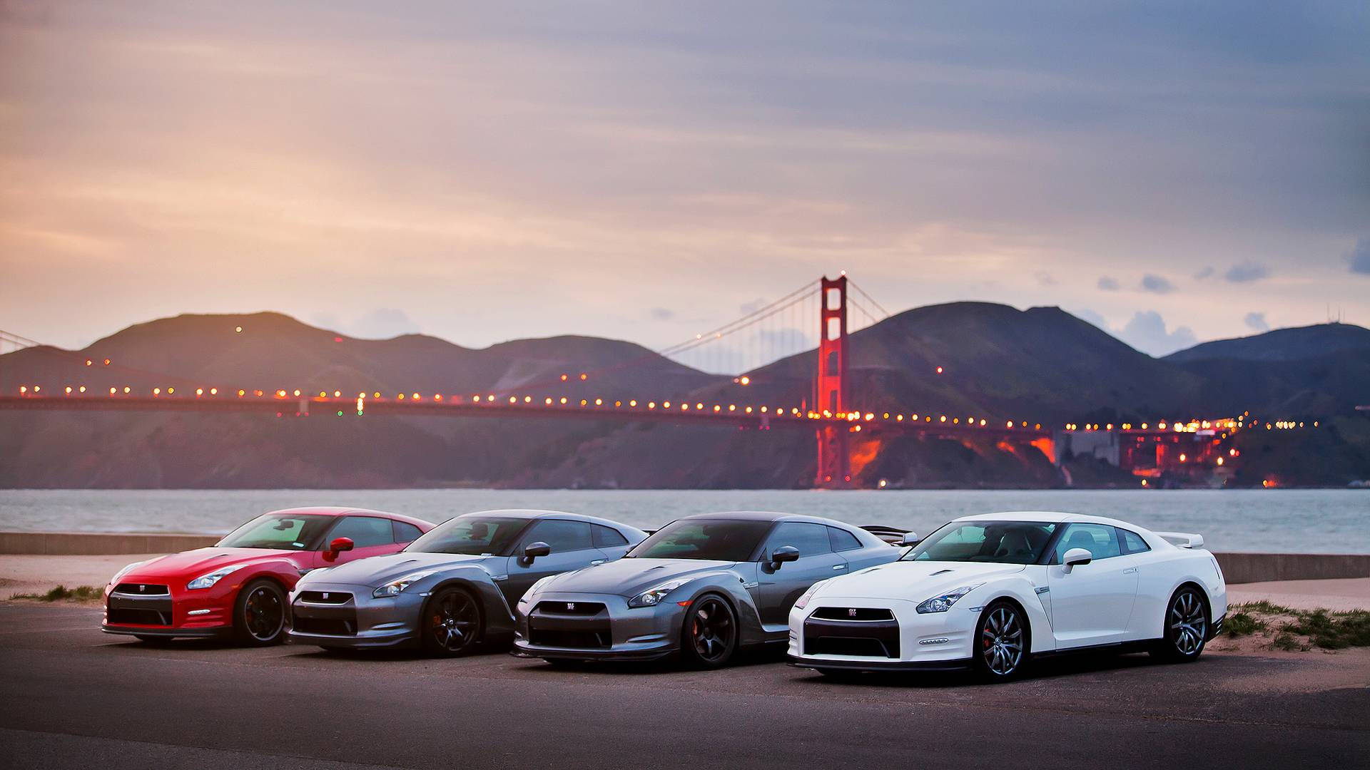 Magari Ya Nissan GTR Yameegeshwa Karibu Na Bahari Picha ya Ukuta