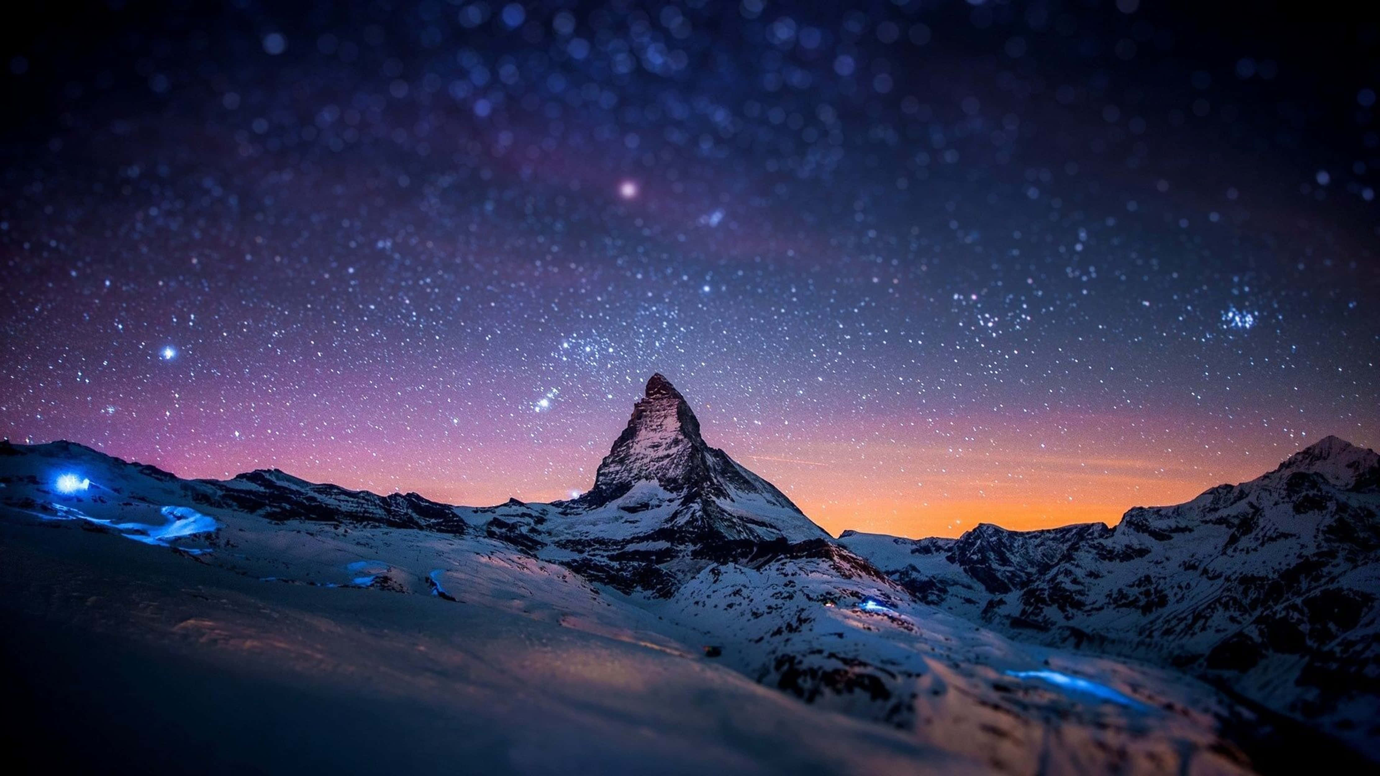 Mandhari ya Usiku ya Matterhorn katika Ulimwengu wa 4K Picha ya Ukuta