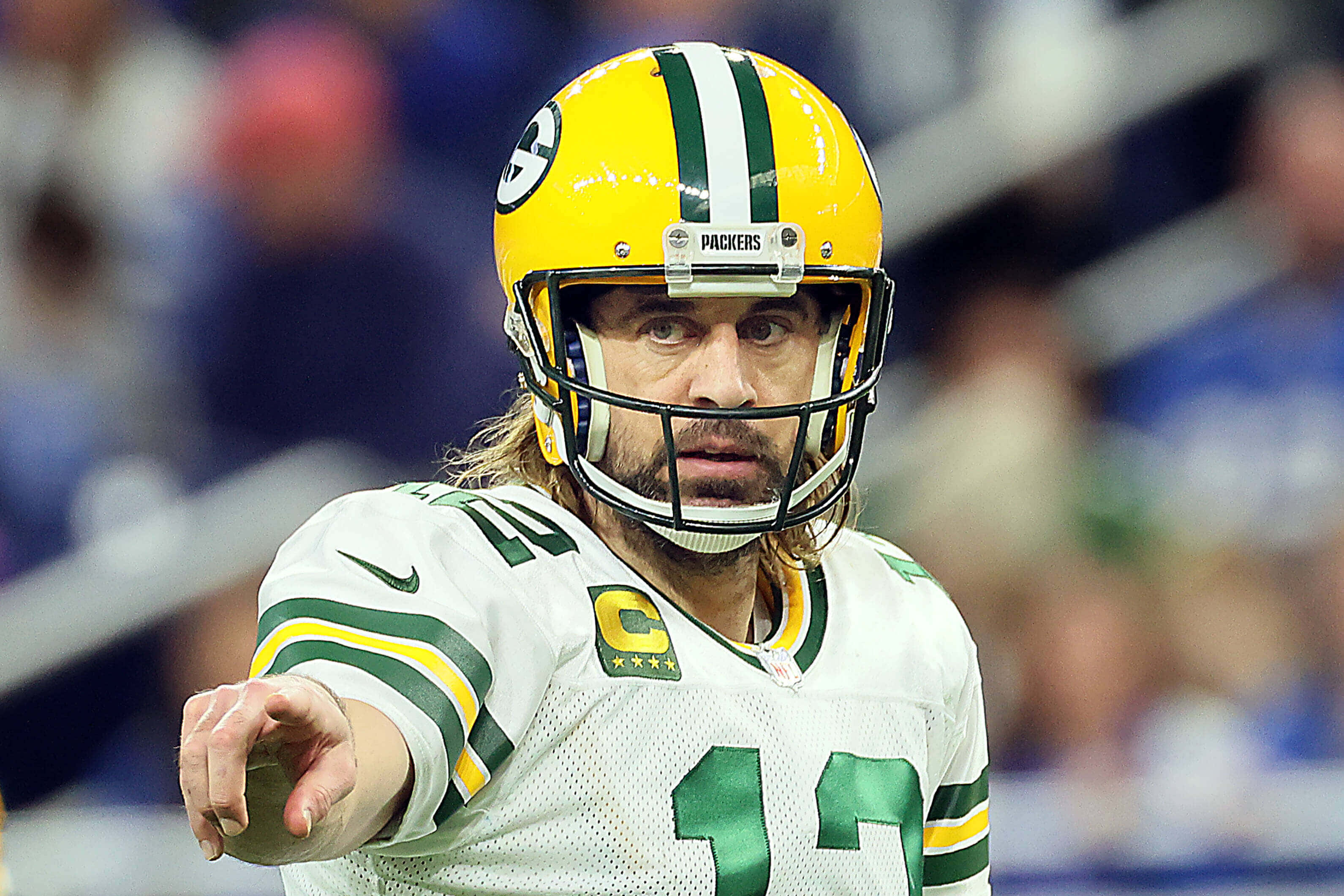 Mchezaji wa Green Bay Packers Aaron Rodgers anapiga pasi ya touchdown Picha ya Ukuta