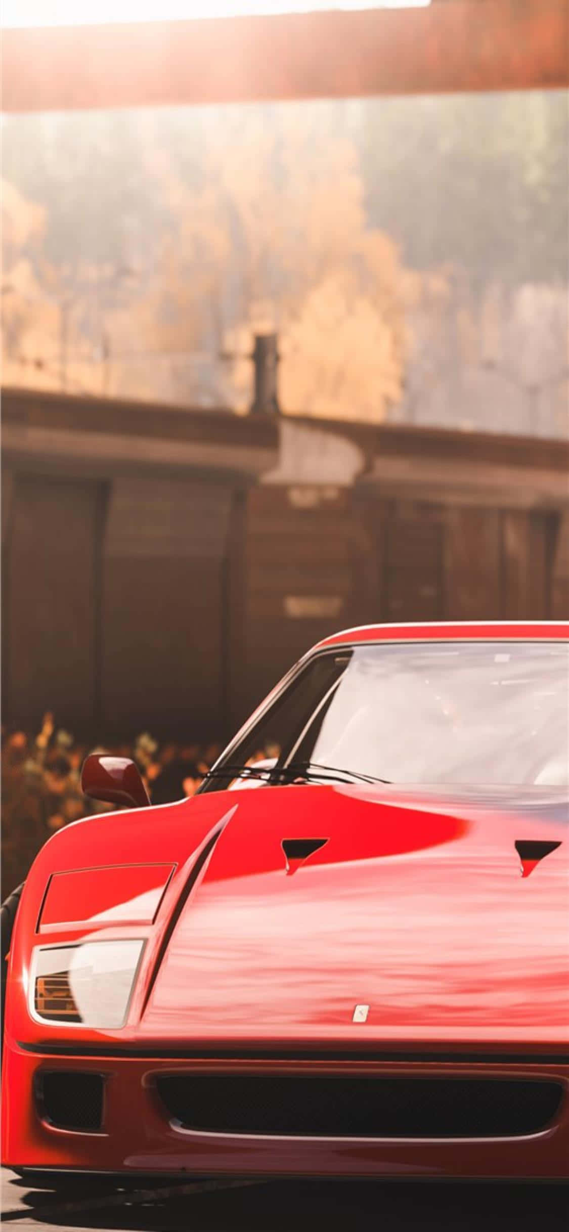 Kusisimua wa mchezo kwenye iPhone X na Forza Horizon 4 Picha ya Ukuta