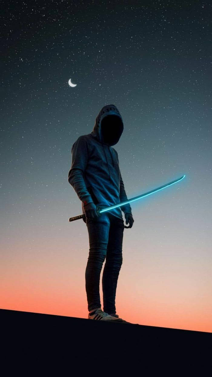 Mtu Mzuri Akiwa na Hoodie Picha ya Ukuta