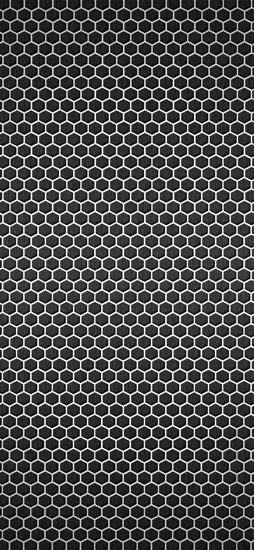 muundo wa hexagonal wa rangi nyeusi na nyeusi kwenye background nyeusi Picha ya Ukuta