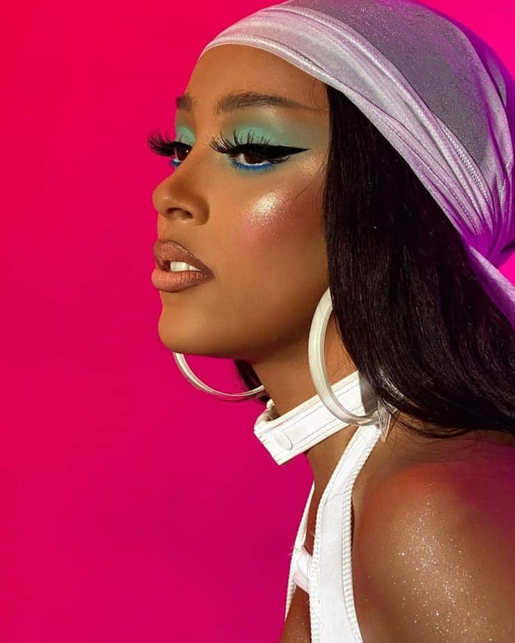 Mwanamuziki wa R&B Doja Cat akitumbuiza jukwaani Picha ya Ukuta