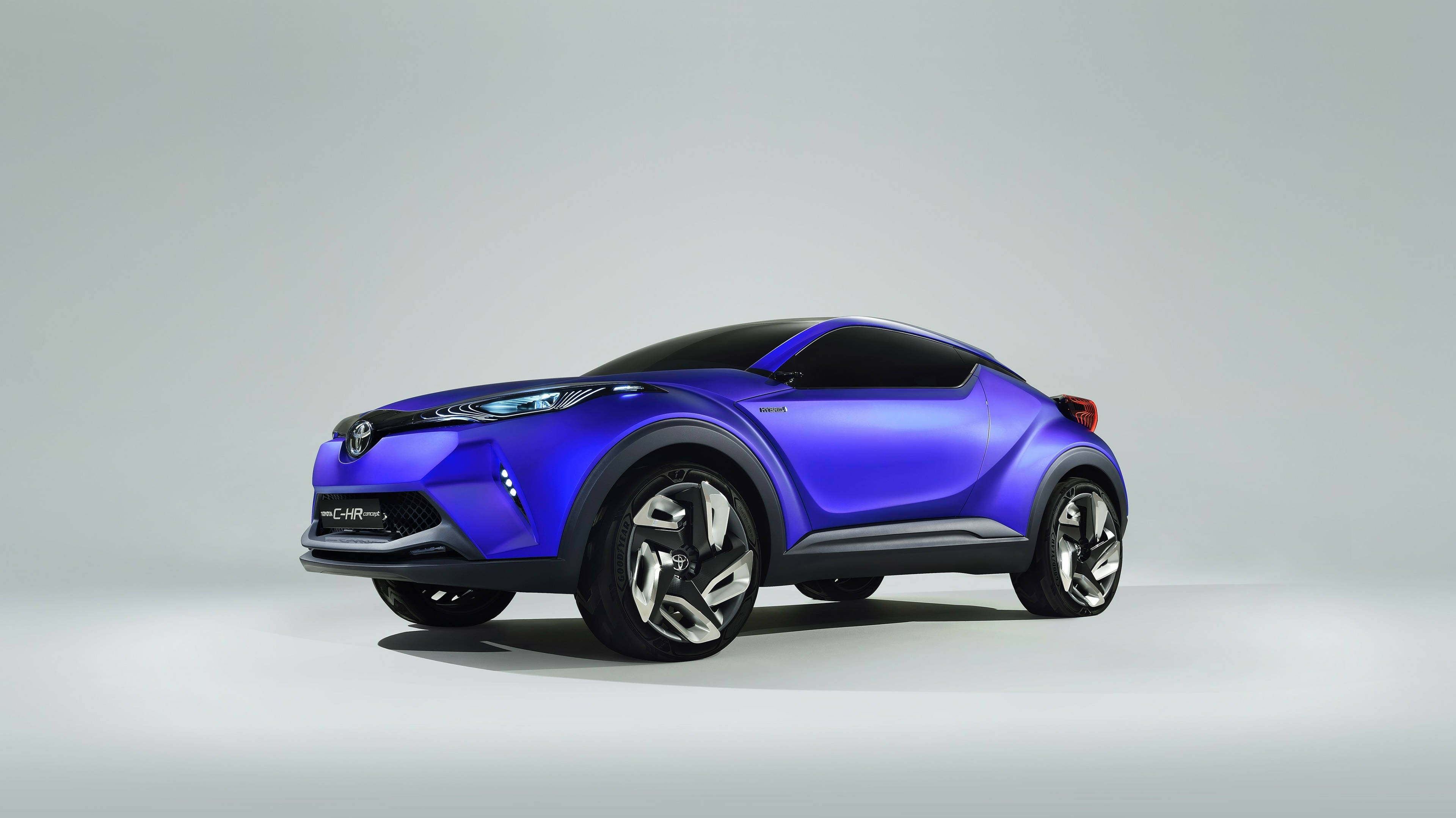 Mwonekano wa Pembeni wa Toyota CH-R ya Bluu 4K Picha ya Ukuta