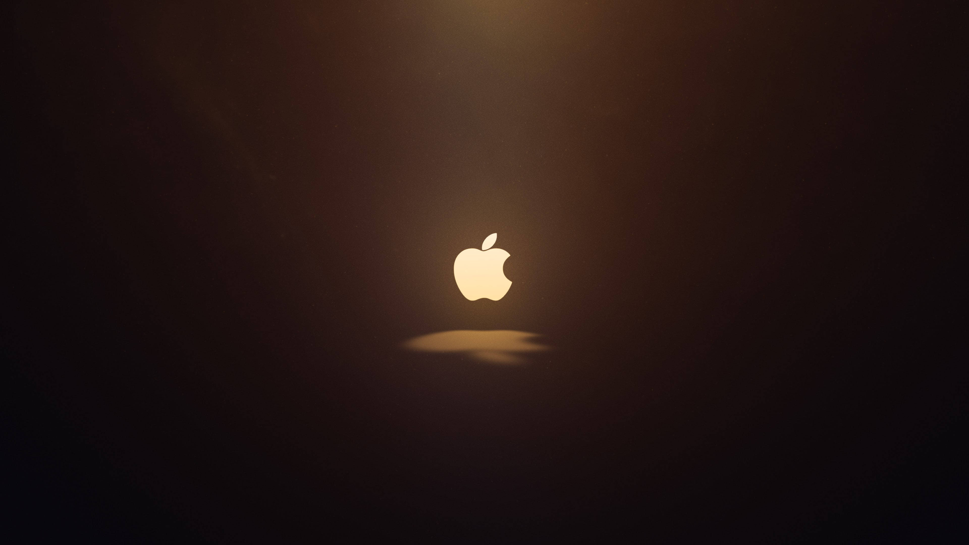 Nembo ya Apple Inayoangaza Macbook Air Picha ya Ukuta