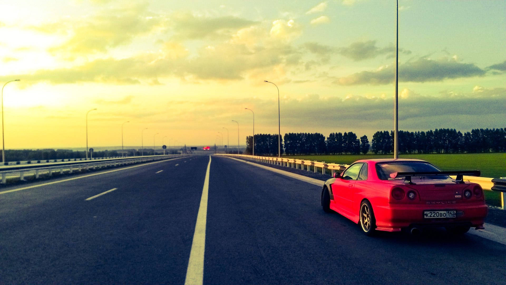 Nissan Skyline Gtr R34 Barabara ya Machweo Picha ya Ukuta