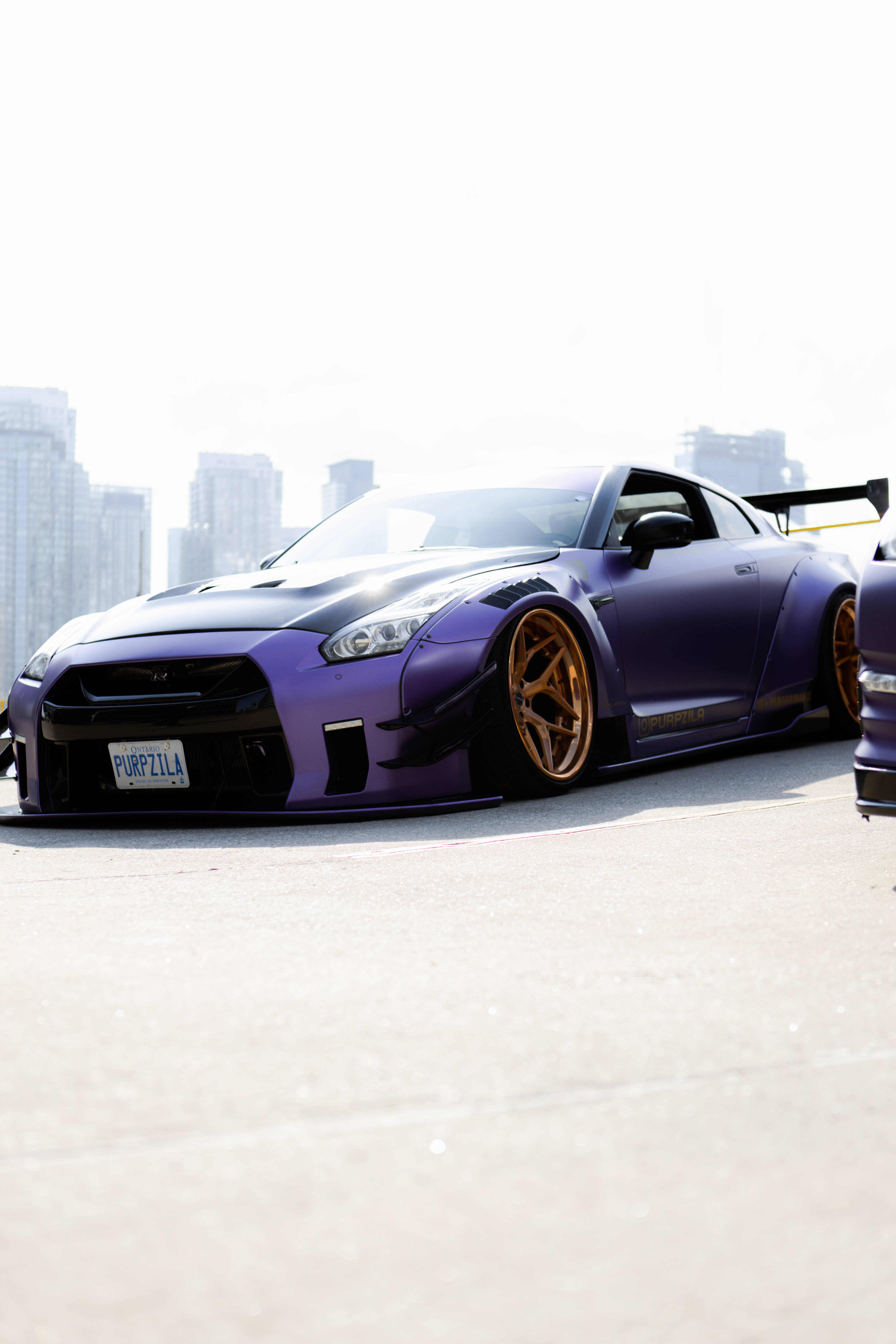 Nissan Skyline GTR R34 ya Zambarau Picha ya Ukuta