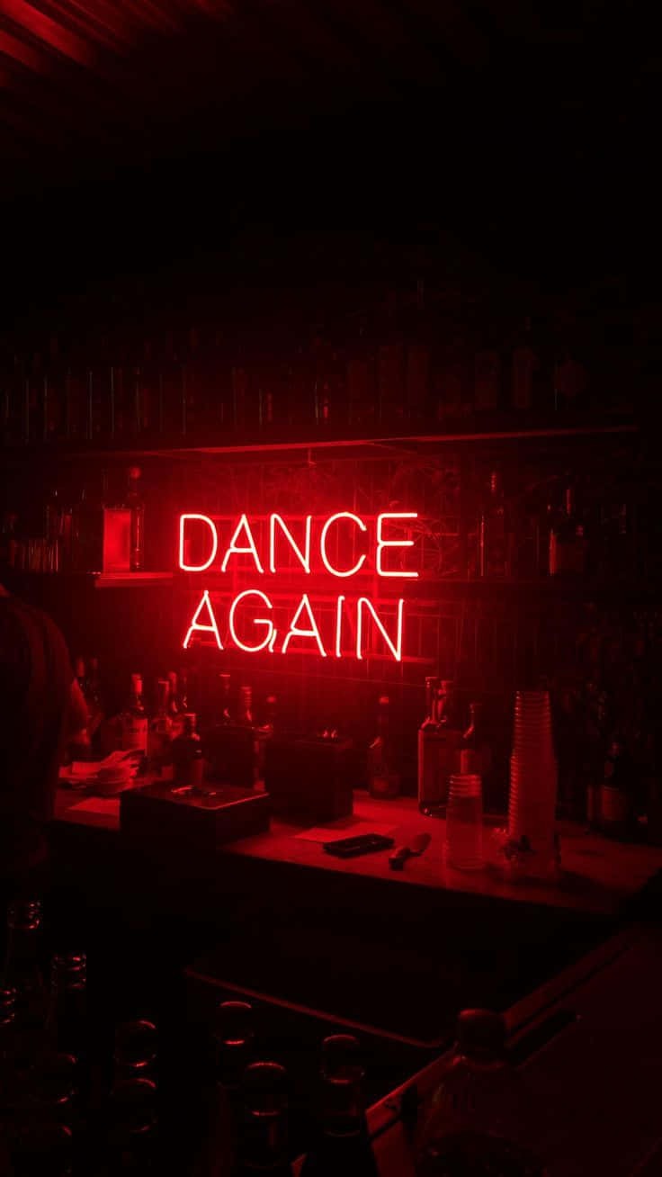 Nukuu ya Neon Inayoangaza kwenye Mandhari ya Giza Picha ya Ukuta