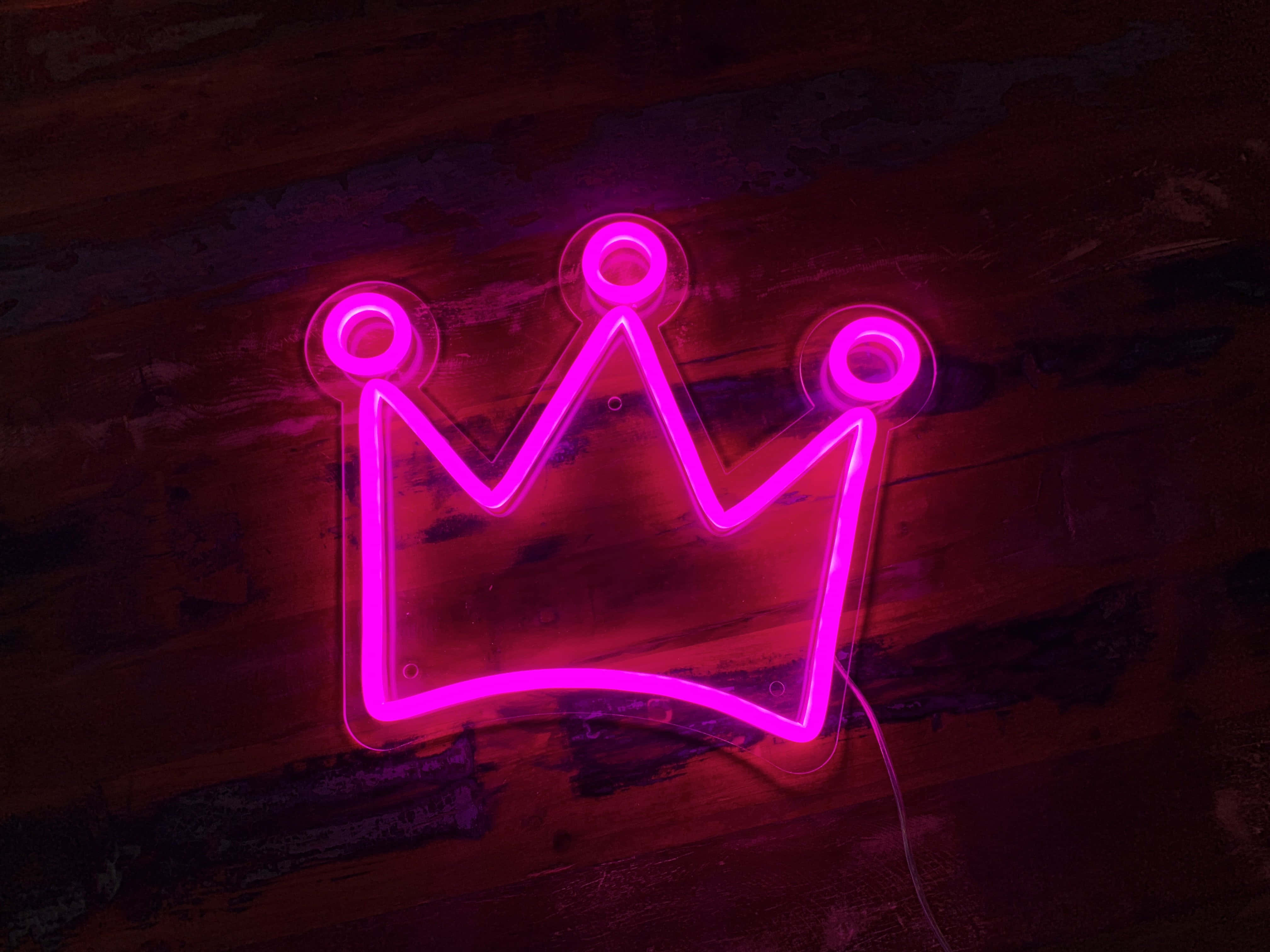 "Ongeza mguso wa waridi maishani mwako kwa urembo wa neon pink!" Picha ya Ukuta