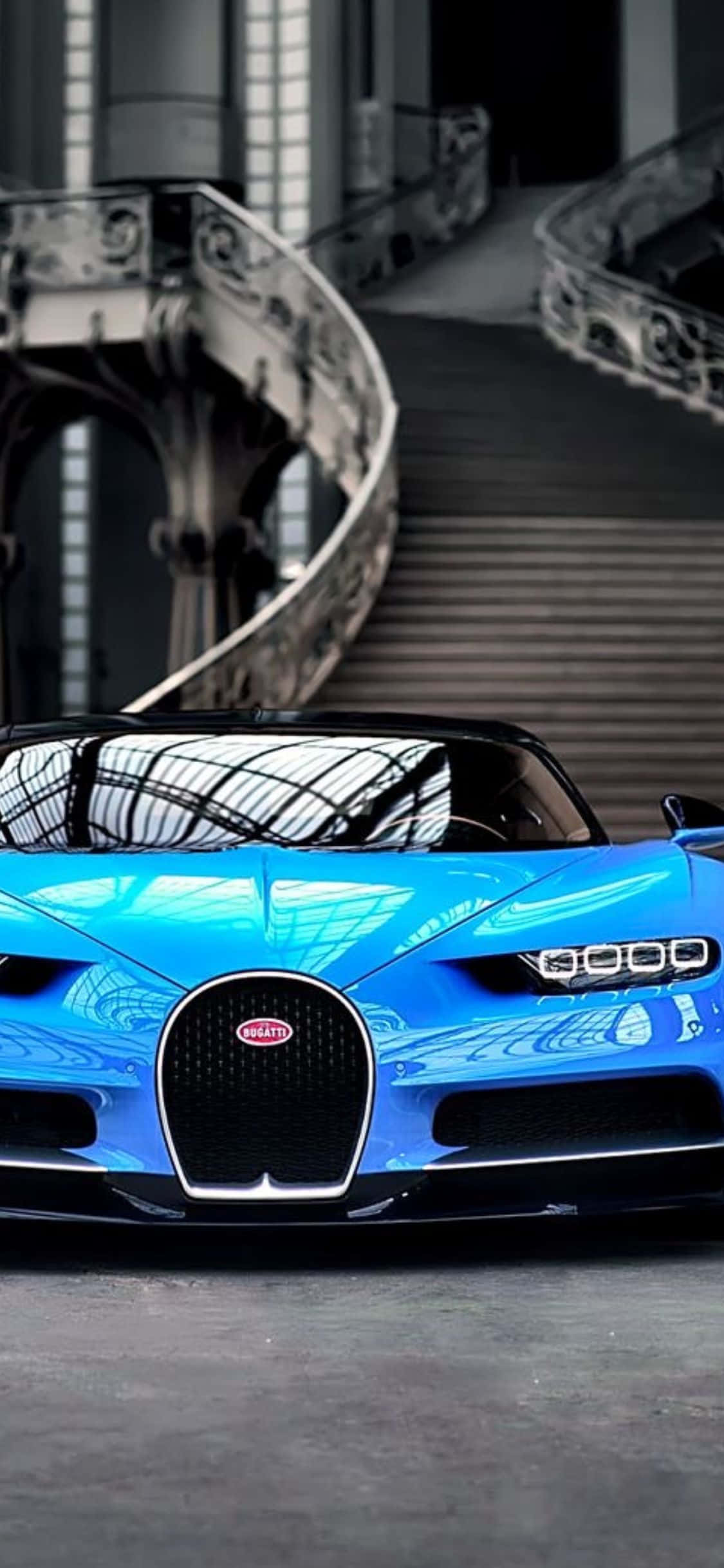"Own the latest iPhone XS with this sleek and sophisticated Bugatti design background." Picha ya Ukuta