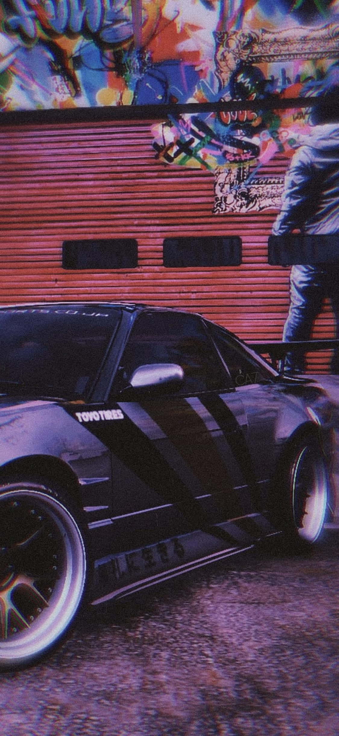 Pata msisimko wako wa kasi ya kusisimua na Need For Speed Heat kwenye iPhone Xs. Picha ya Ukuta