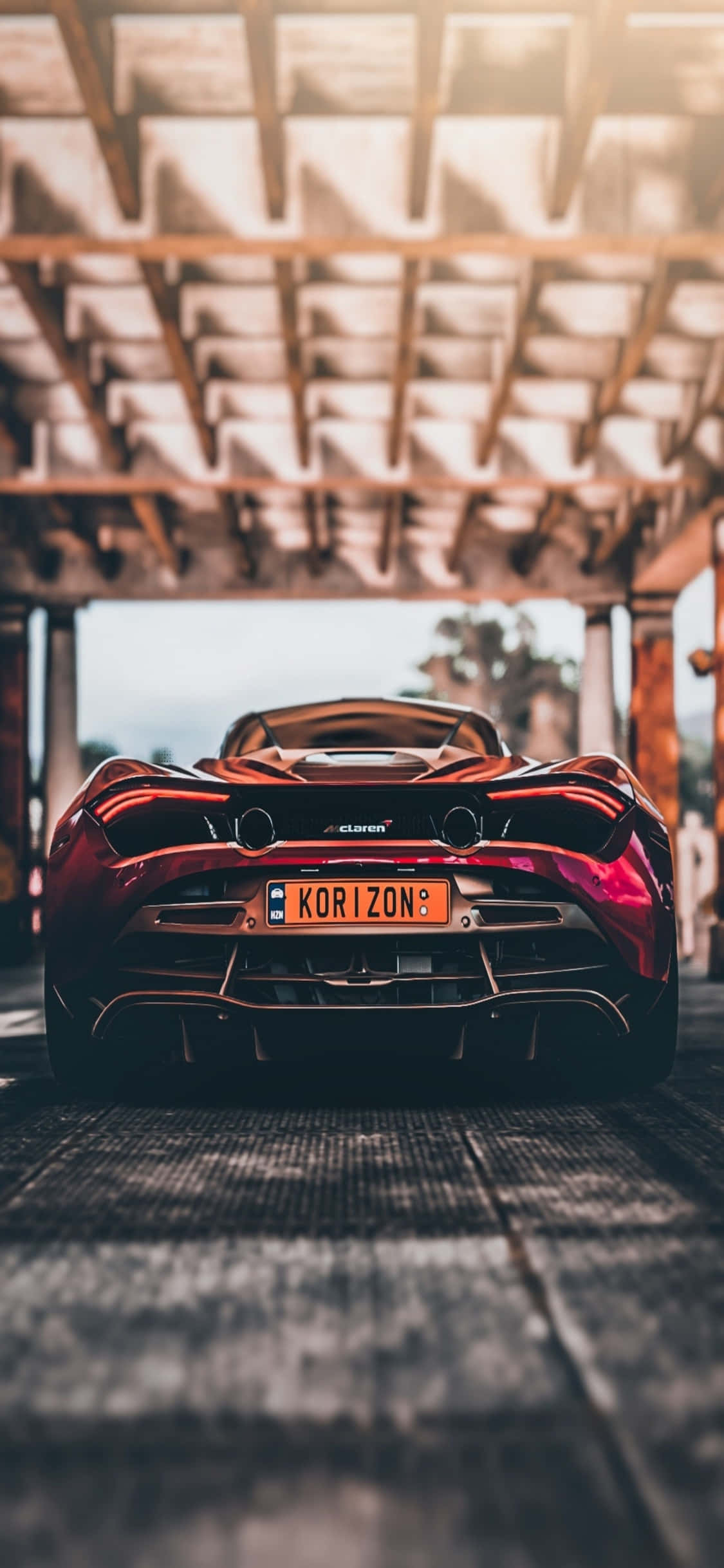 Chukua hatamu ya iPhone Xs Mclaren 720s Picha ya Ukuta