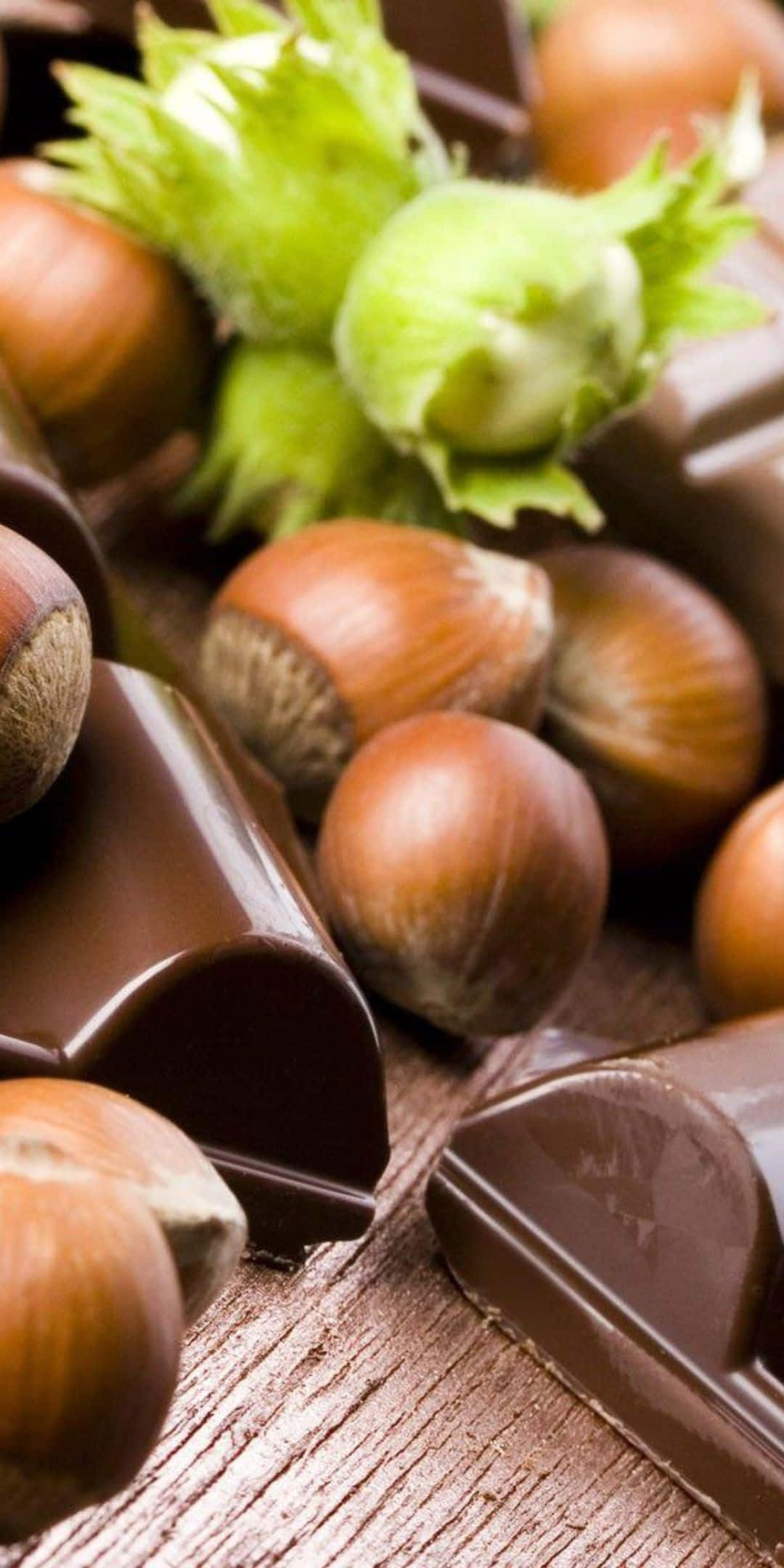Pembizeli 3 Chakula Hazelnut Chocolate Background Picha ya Ukuta