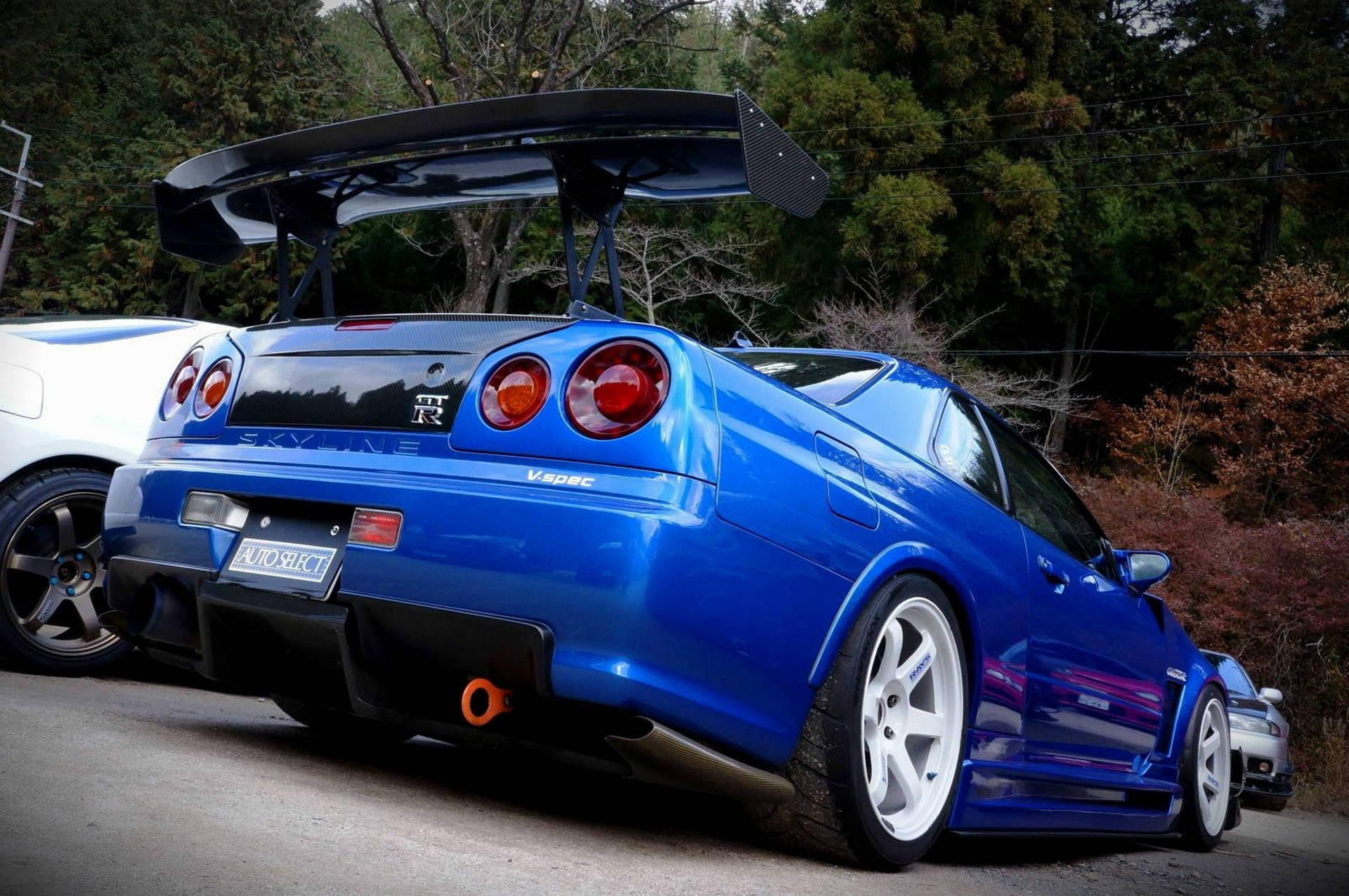 Picha tukufu ya Nissan Skyline GTR R34 kwa ubora wa juu. Picha ya Ukuta