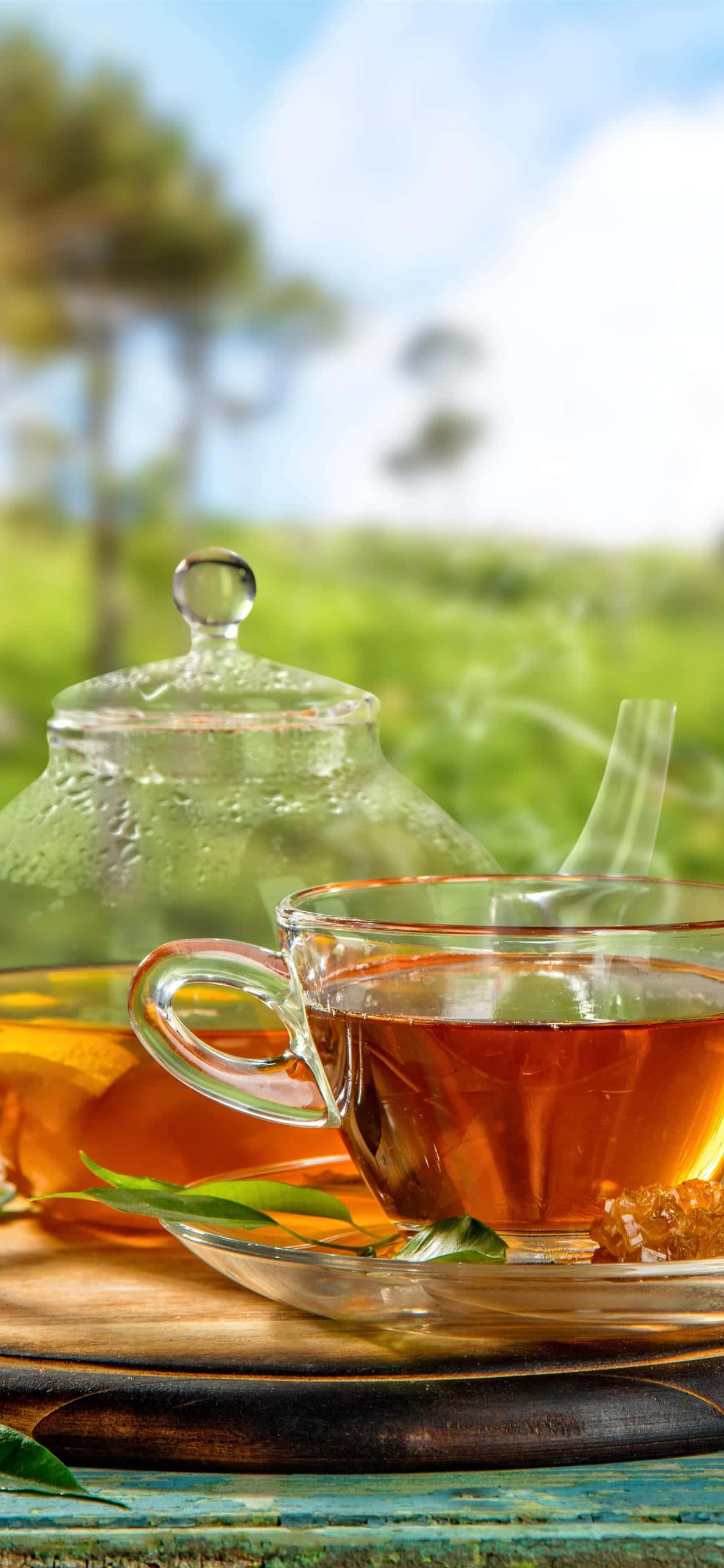 Picha ya Kikombe cha Chai cha Glass na Kettle Picha ya Ukuta